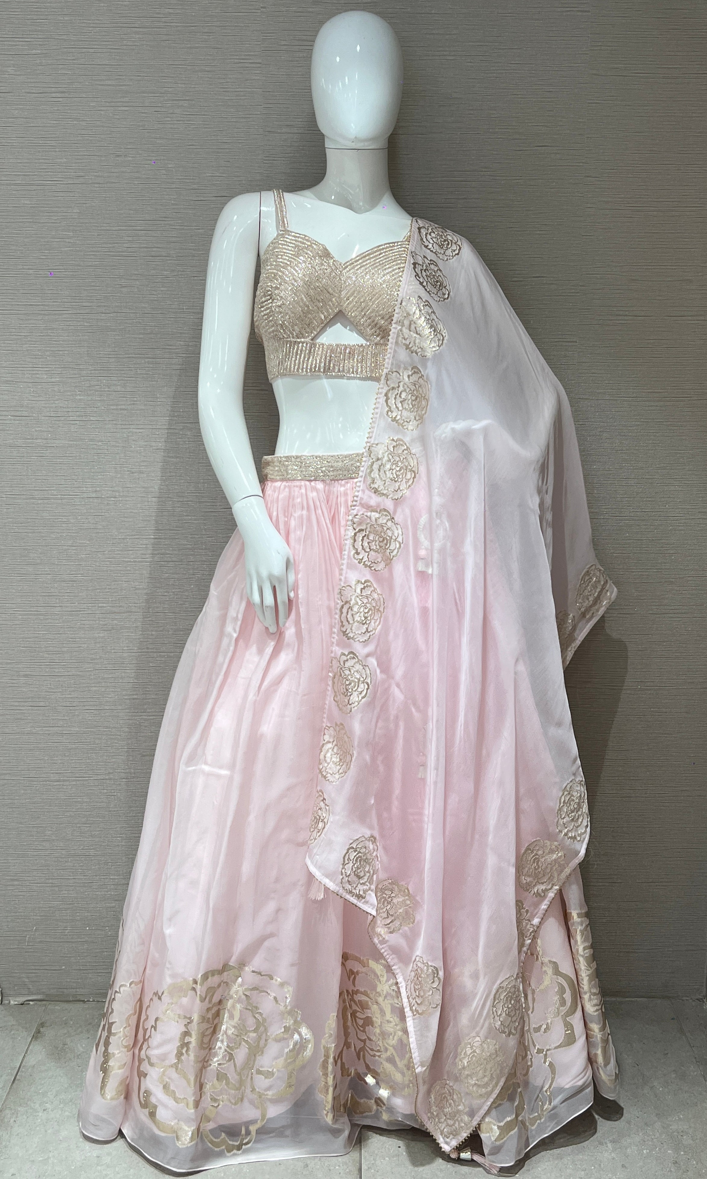 Baby pink Lehenga with floral embossing