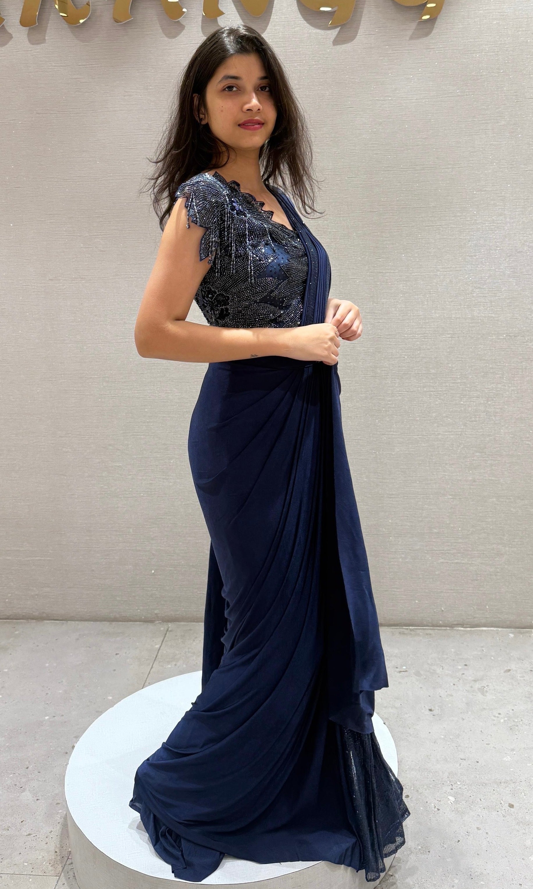 Navy blue sequined blouse drape saree