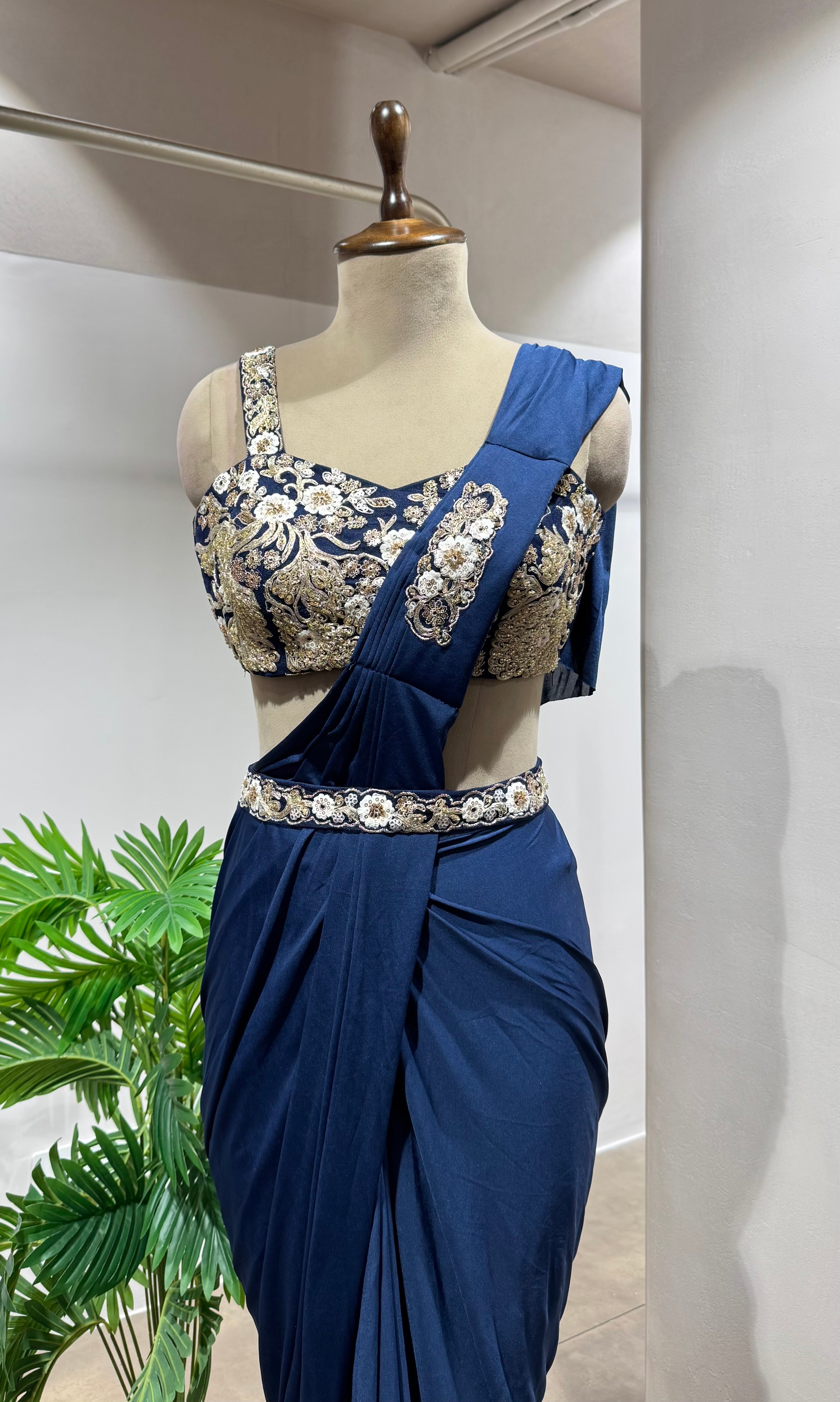 blue embroidered draped saree with corset blouse