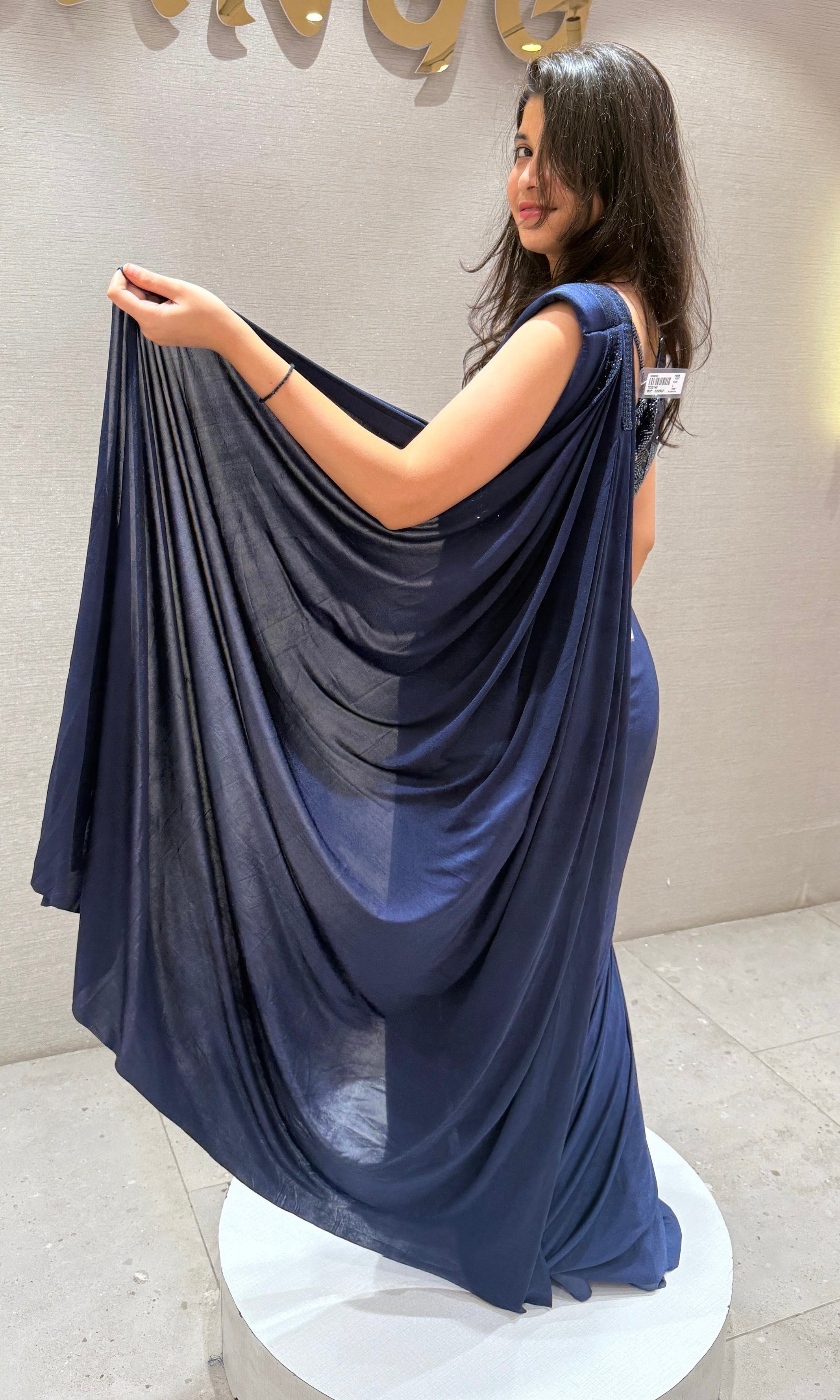 Navy blue sequined blouse drape saree
