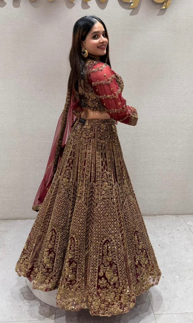 Deep red and gold lehenga