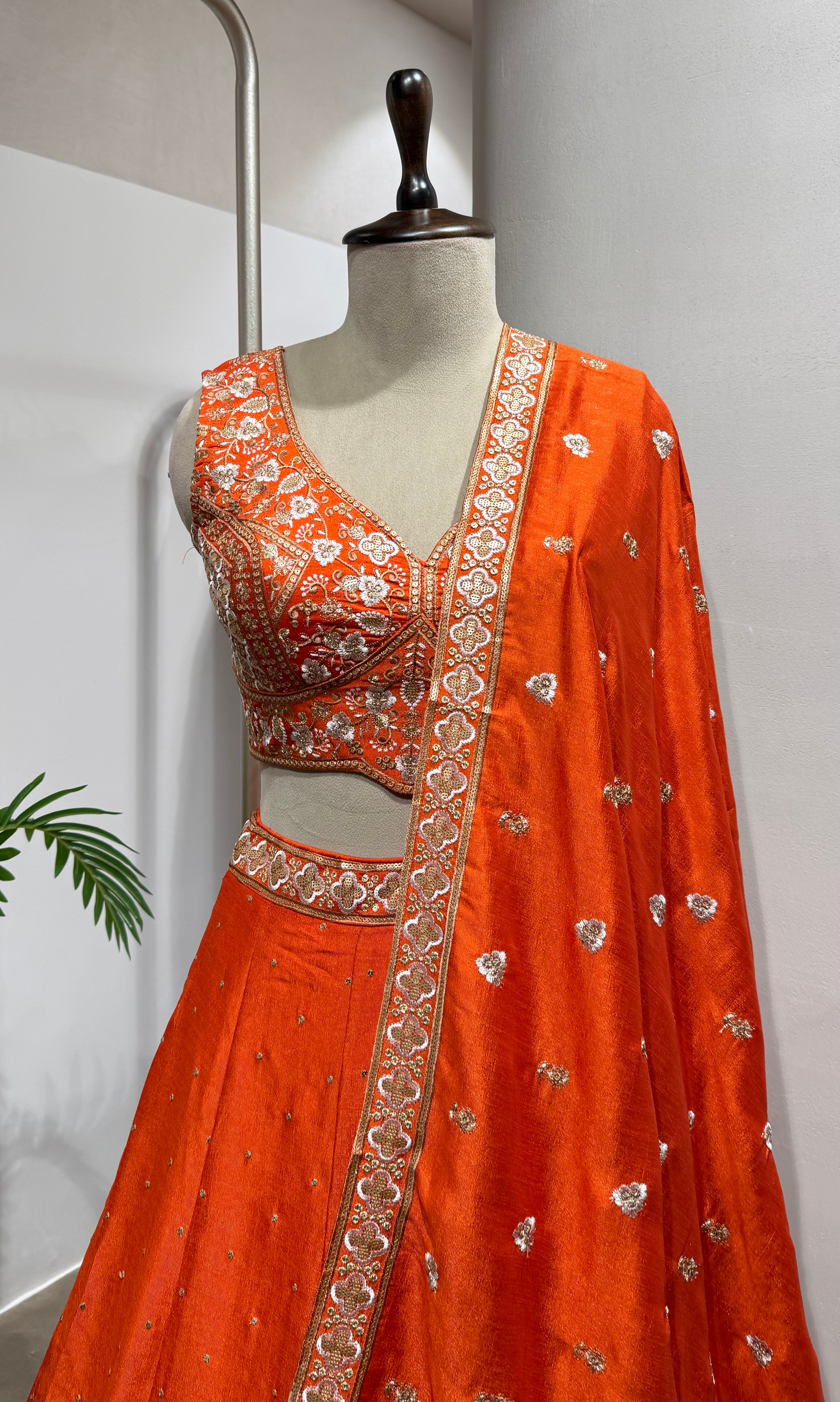 Orange golden embroidery lehenga set
