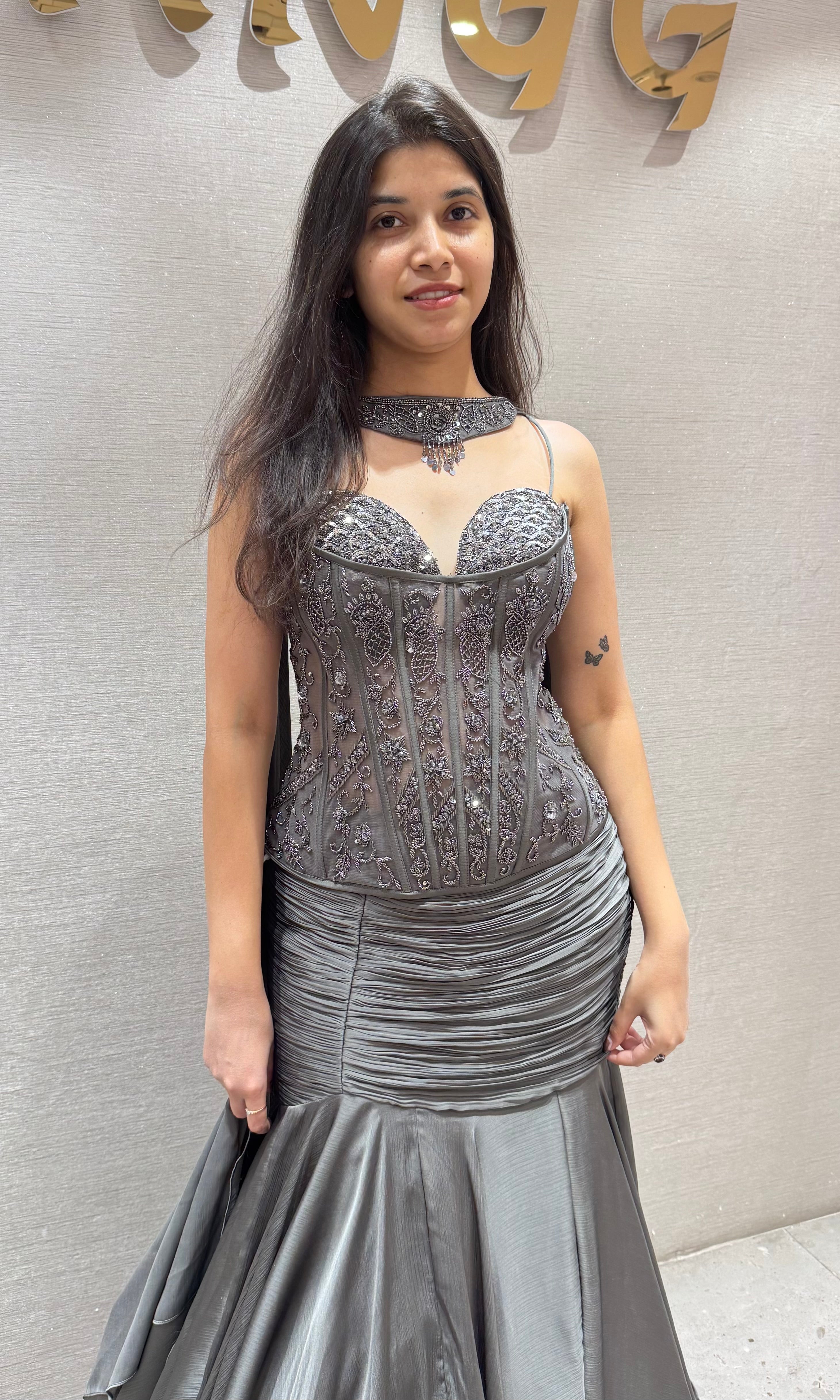 Grey ruffled lehenga with corset blouse