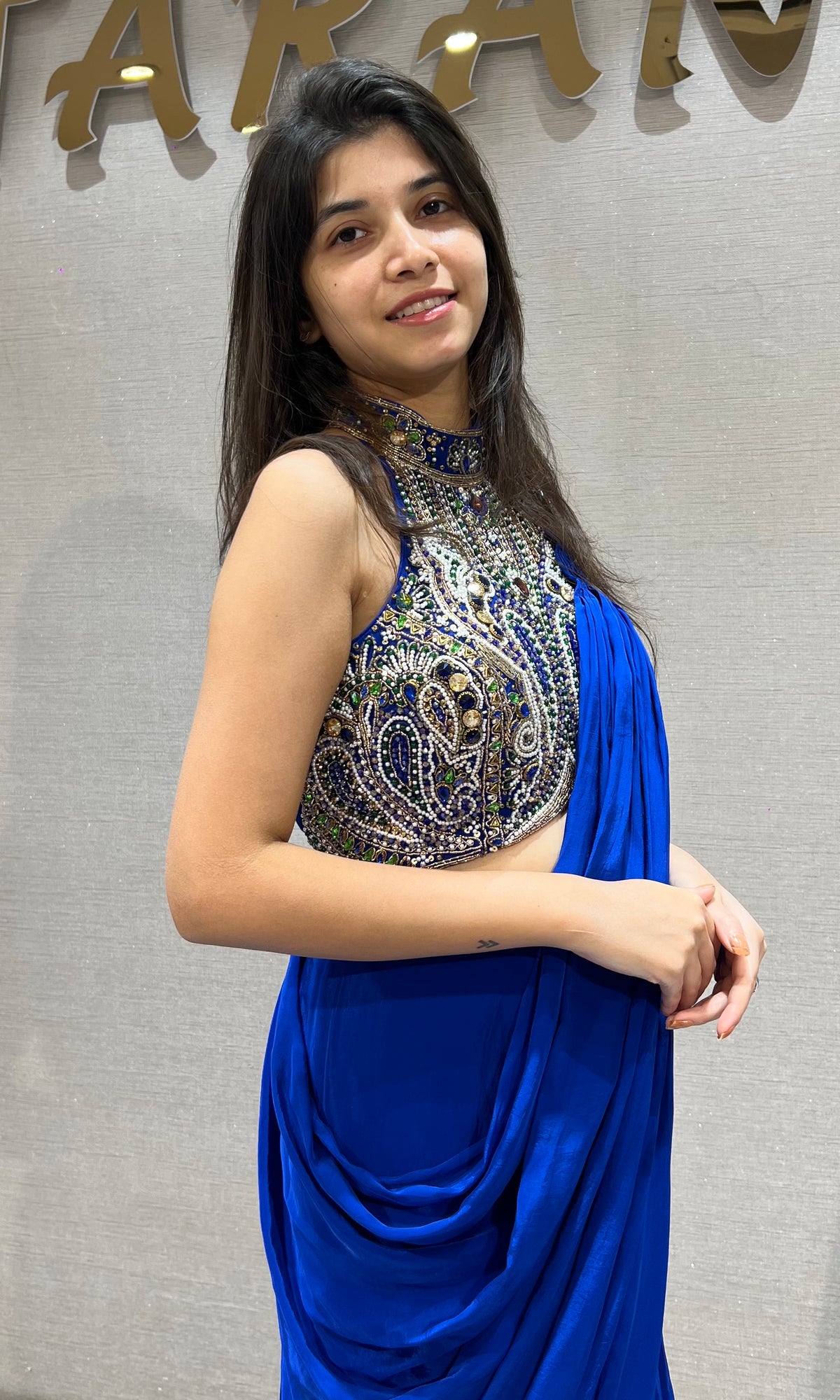 Royal blue draped saree with Crystals & Beadwork Halter blouse