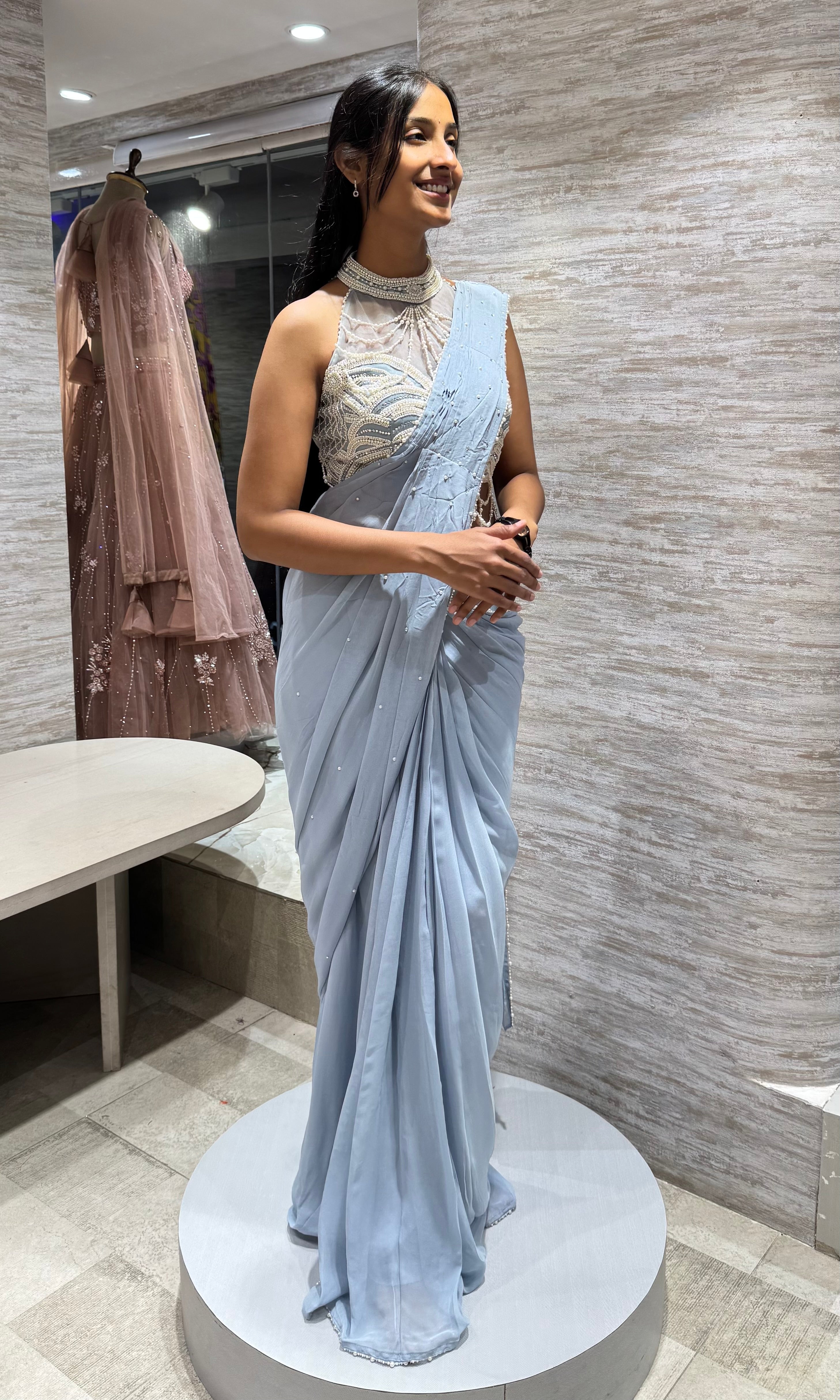 Blue Drape Saree with embellished haler neck