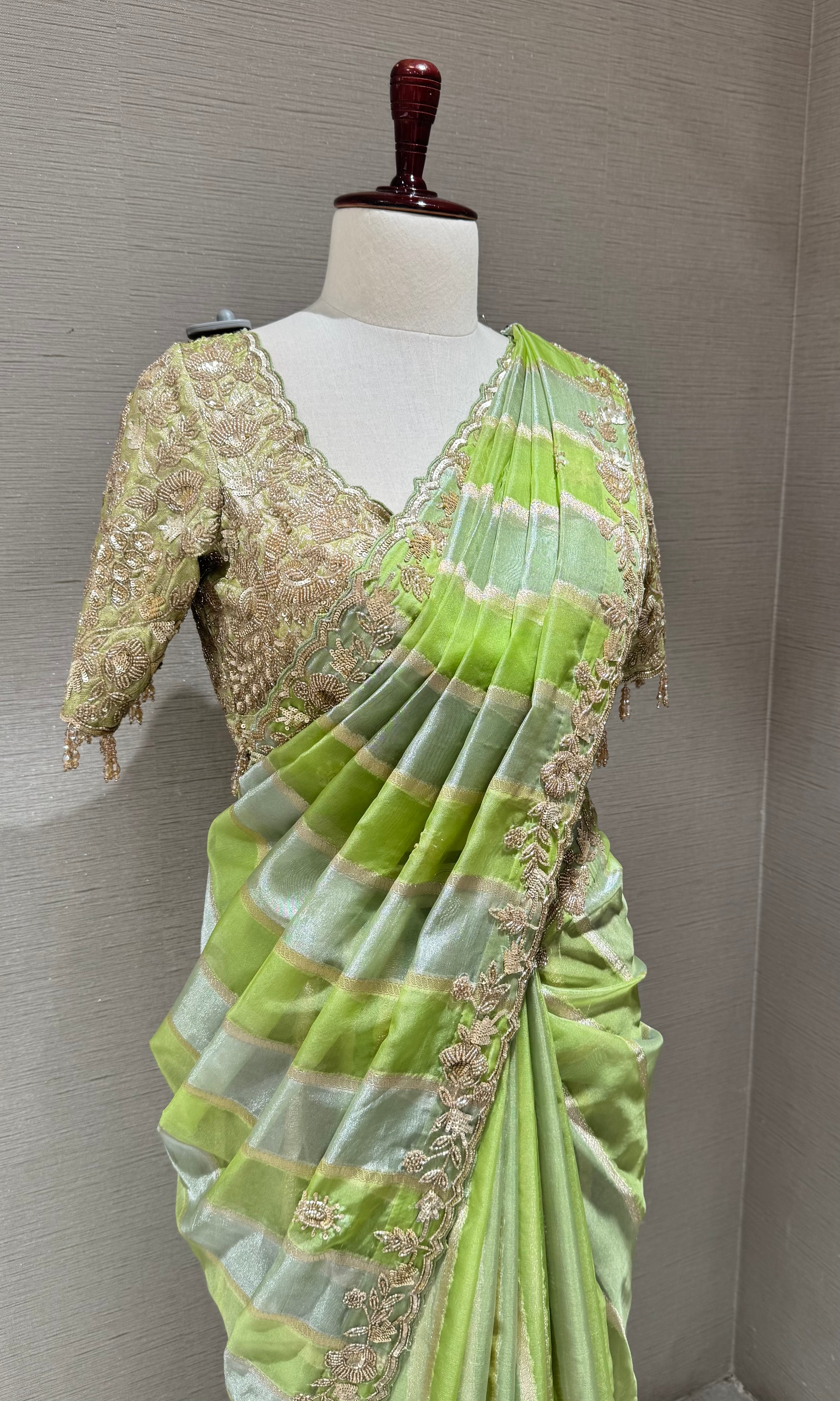 Green designer saree with embroidered blouse