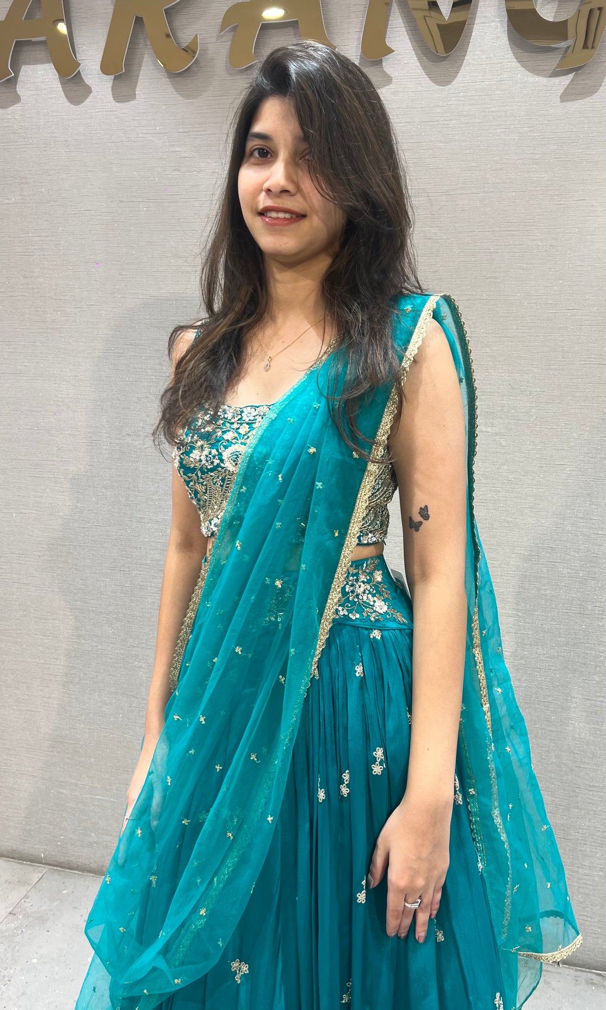 Teal blue gold zari embroidered lehenga