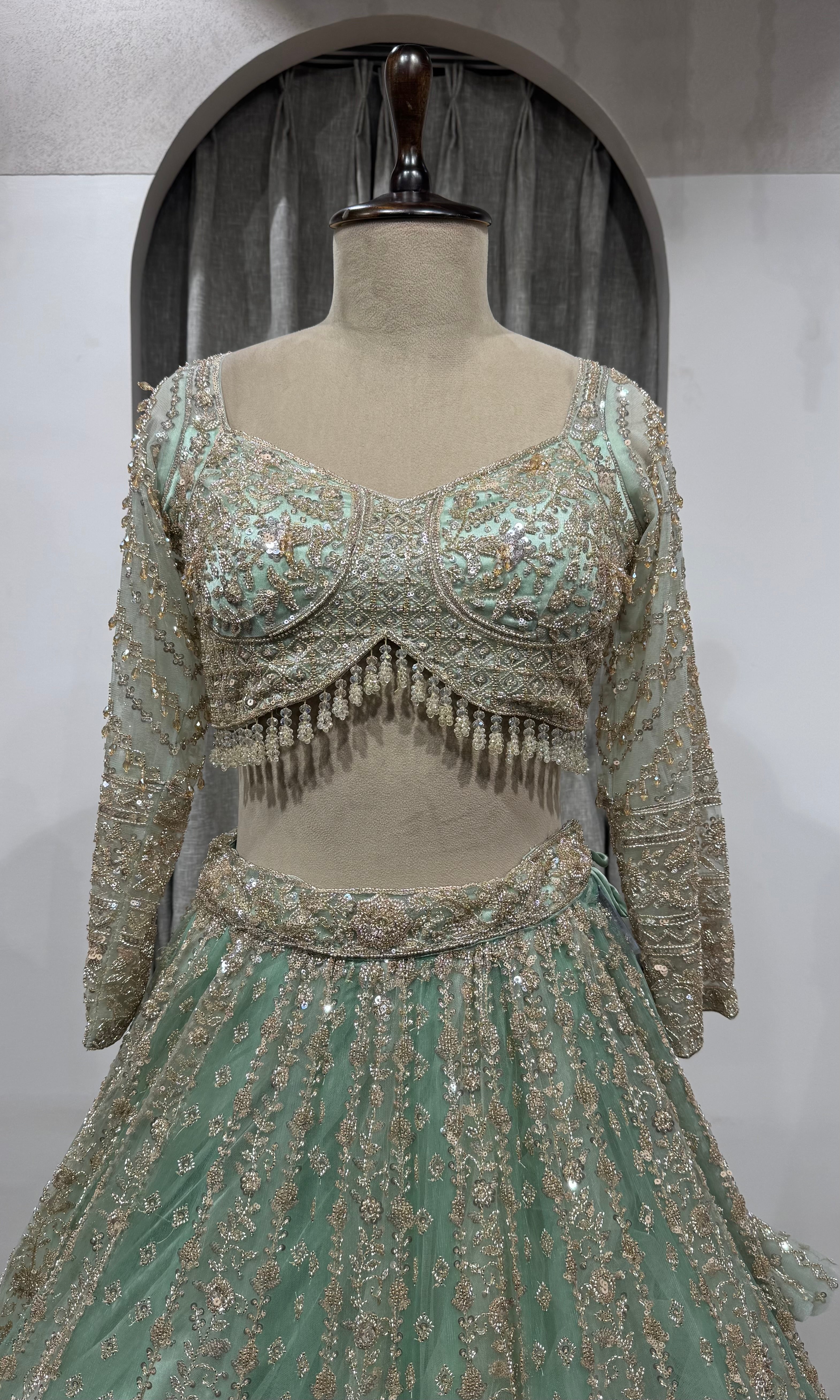 Pista Green Bridal Lehenga with Shimmering Border