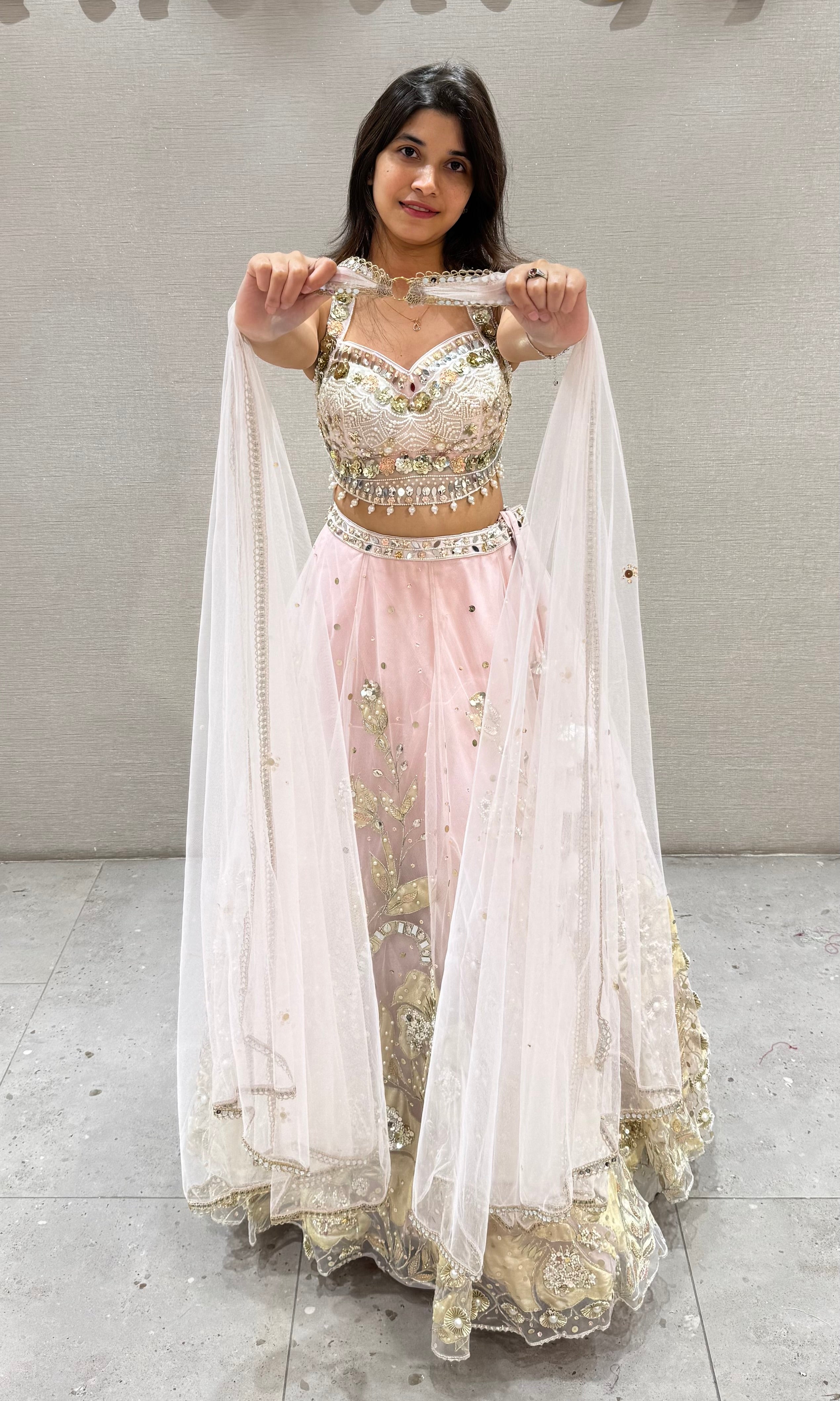Pastel Pink Net Embroidered Bridal Lehenga