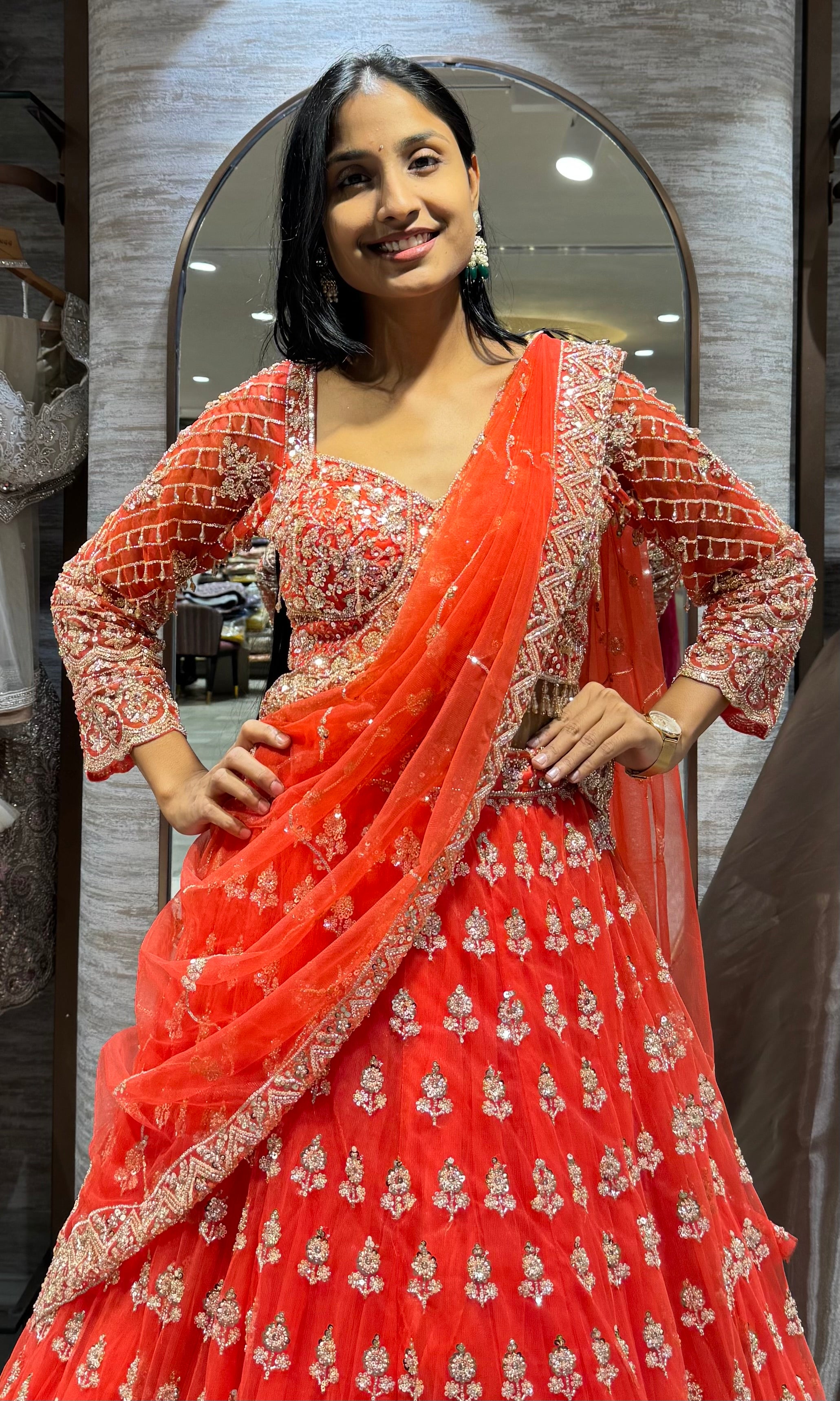 orange bridal intricate embroidery lehenga