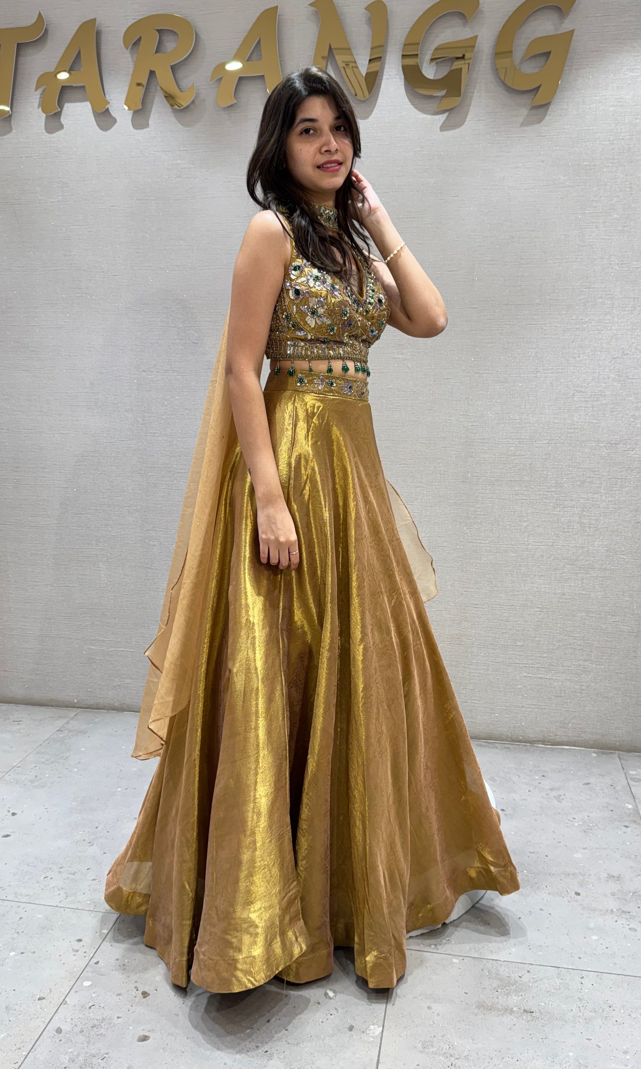 Gold tissue intricate embroidered lehenga