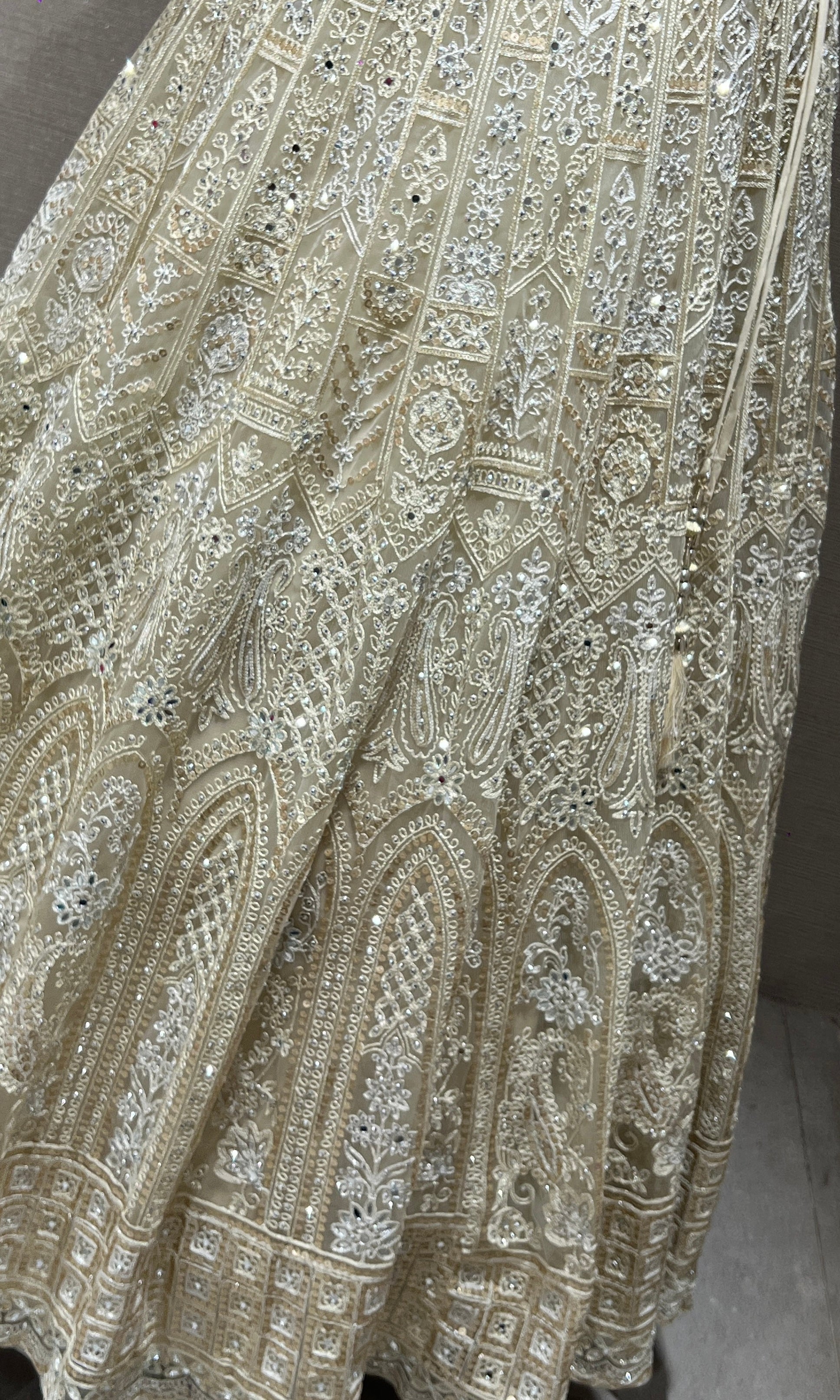 Half white ZARDOZI EMBROIDERED LEHENGA