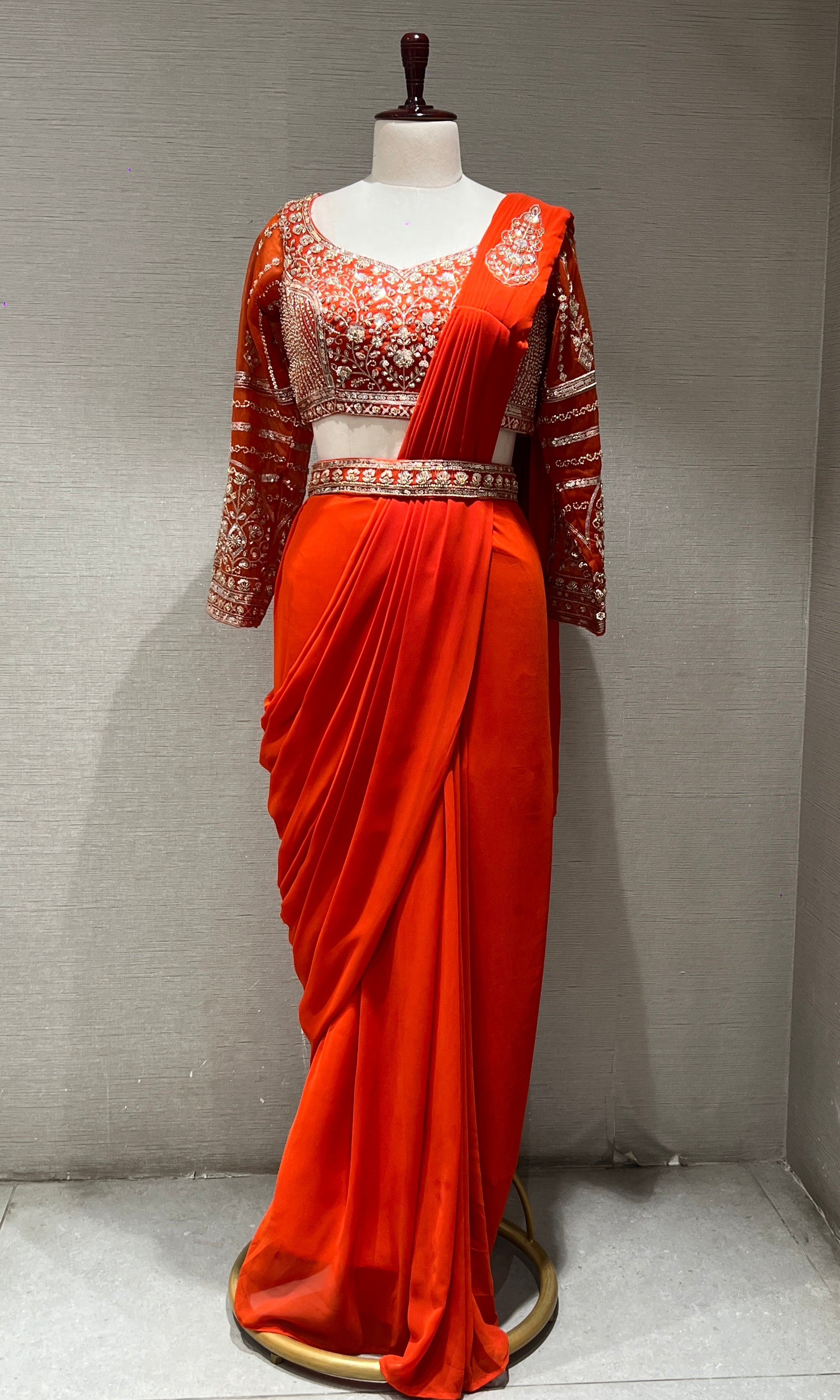 ORANGE drape saree with embellished blouse