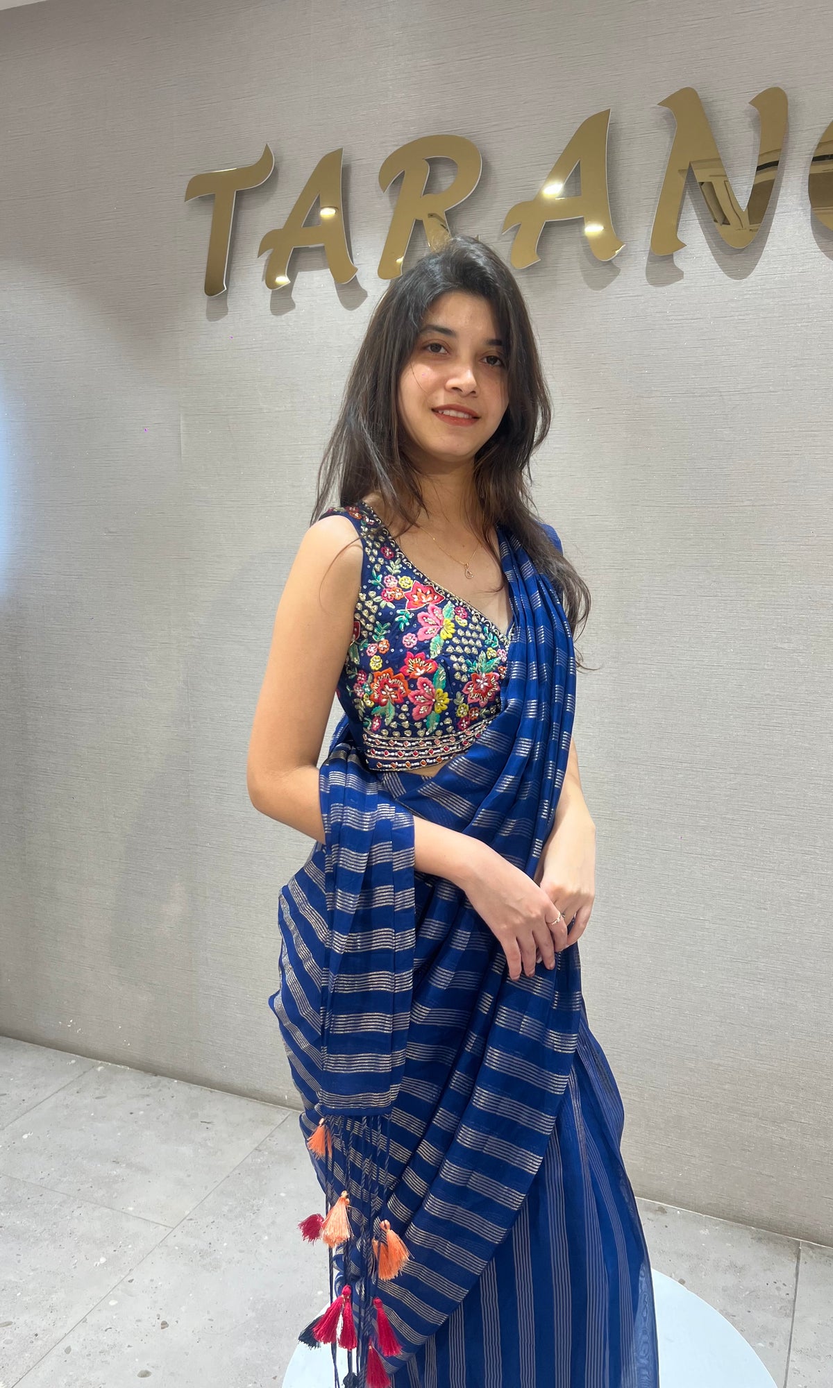 blue and silver striped Drape saree with intricate blouse