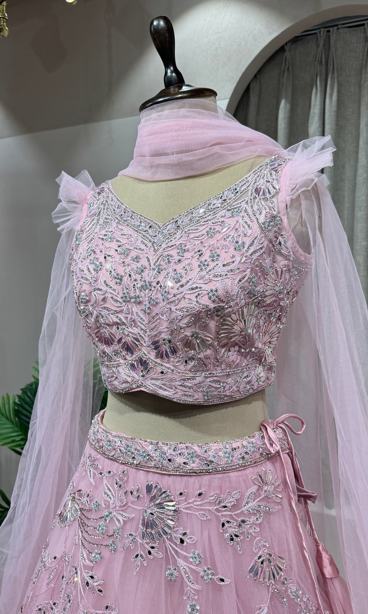 pink floral embroidered net crop top lehenga