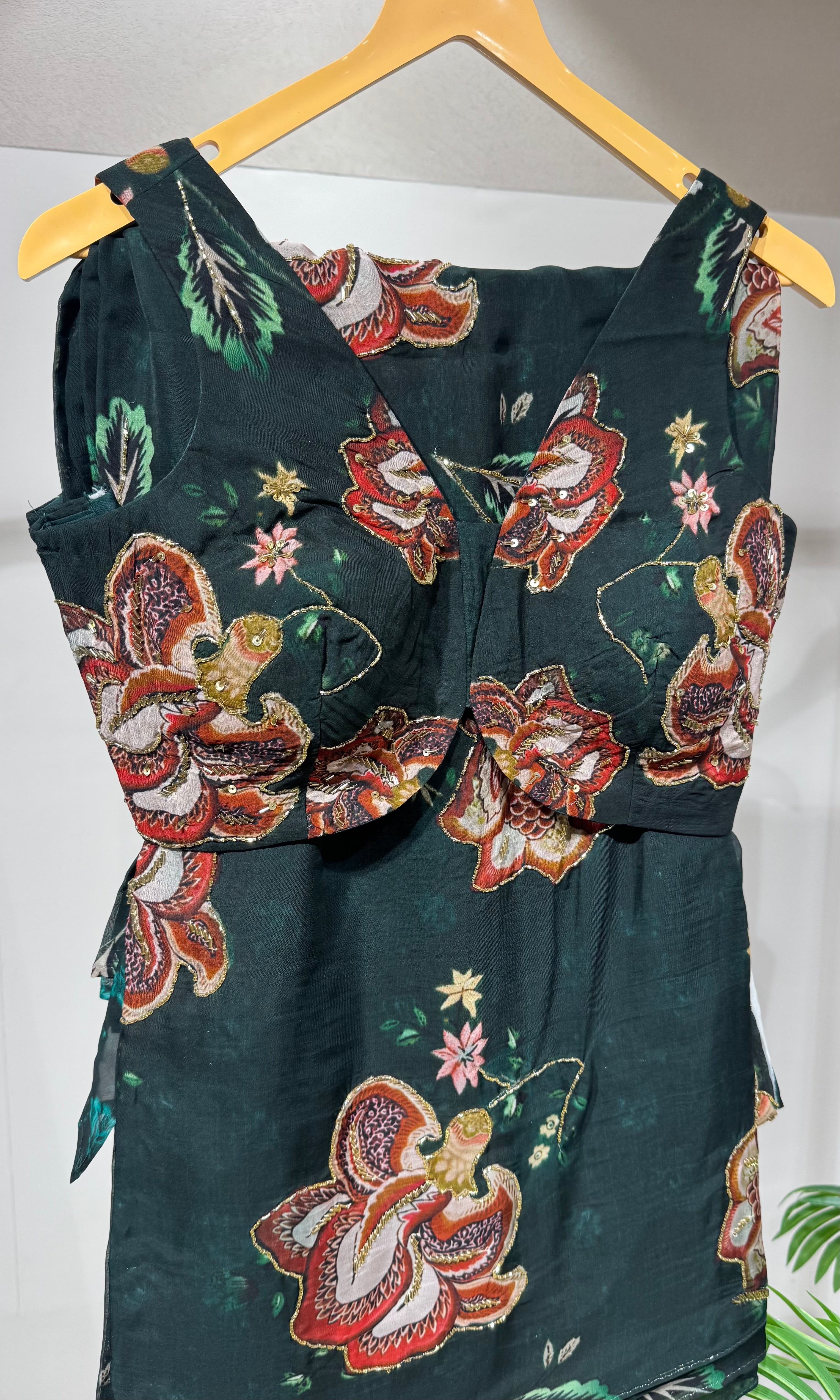 Green floral saree with embroidered blouse