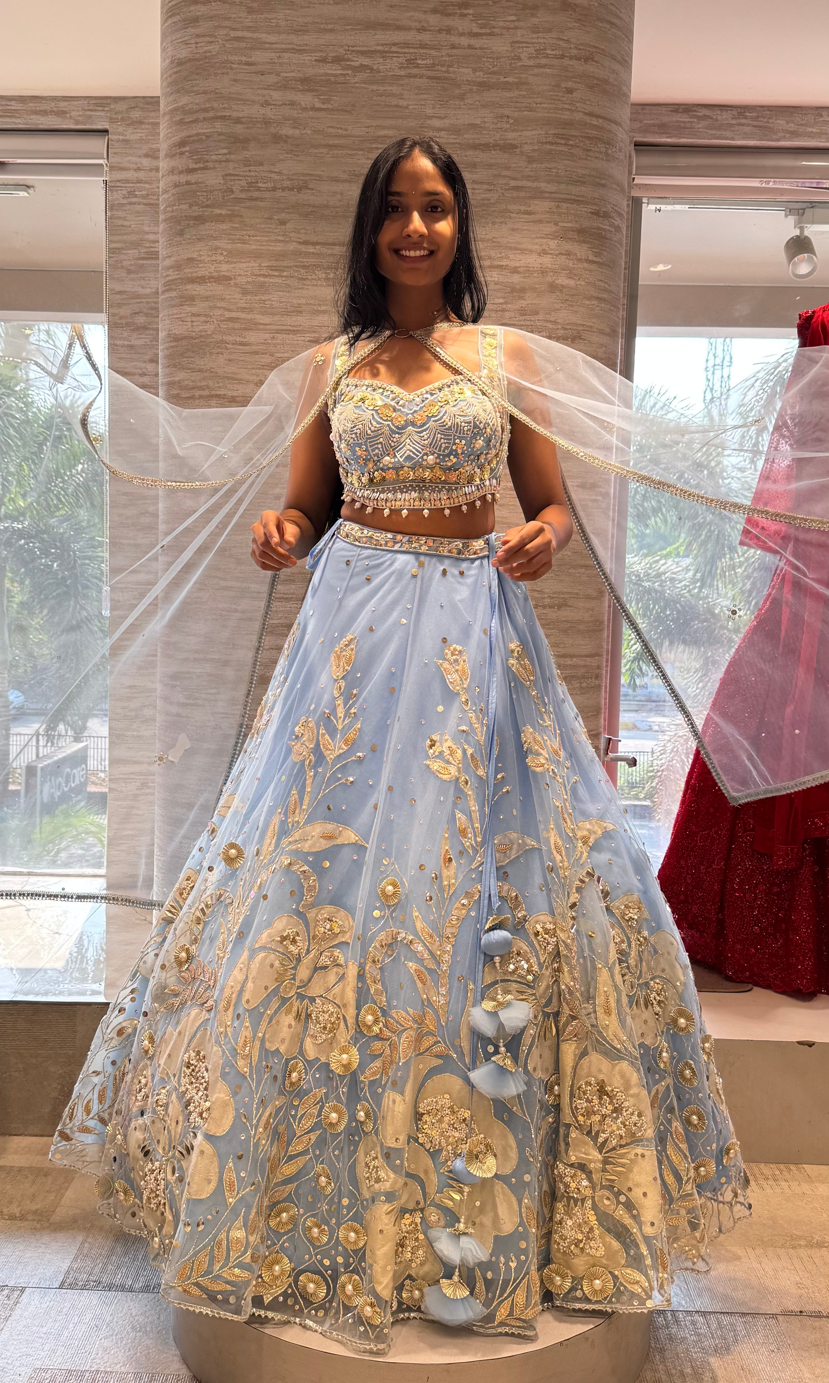Light blue heavy gold embroidery lehenga