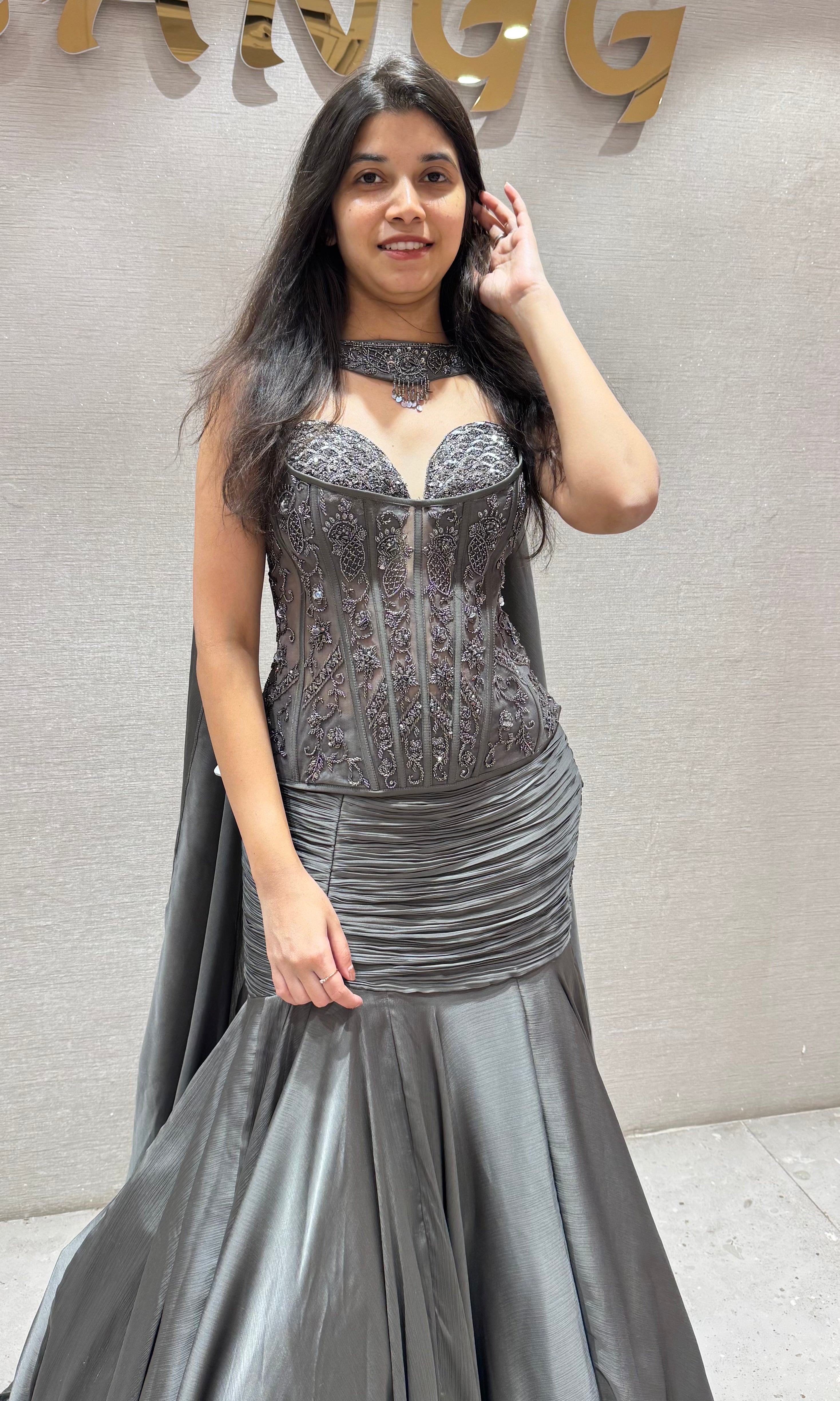 Grey ruffled lehenga with corset blouse