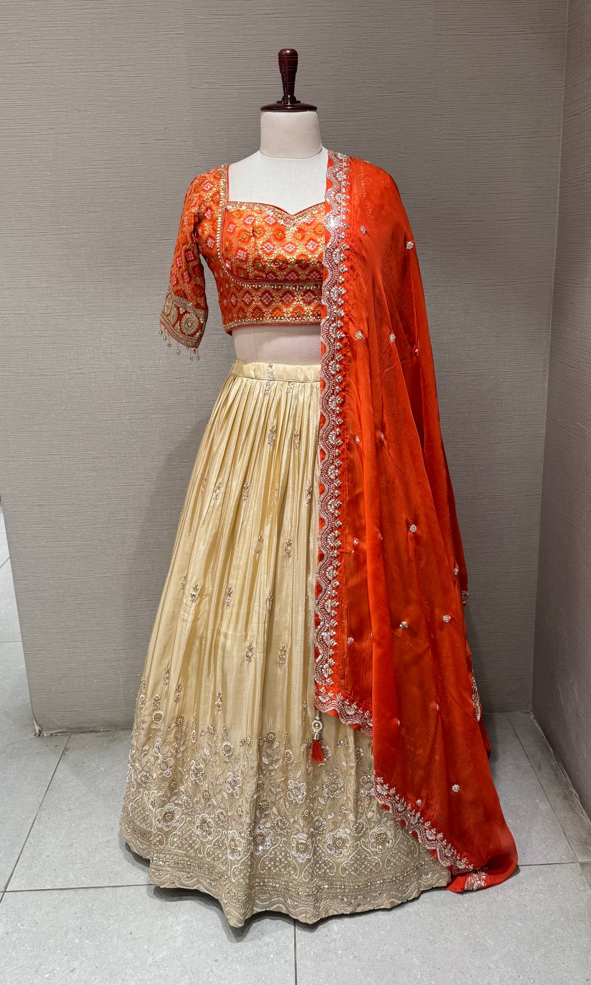 radience Orange and Champagne Silk Lehenga Set