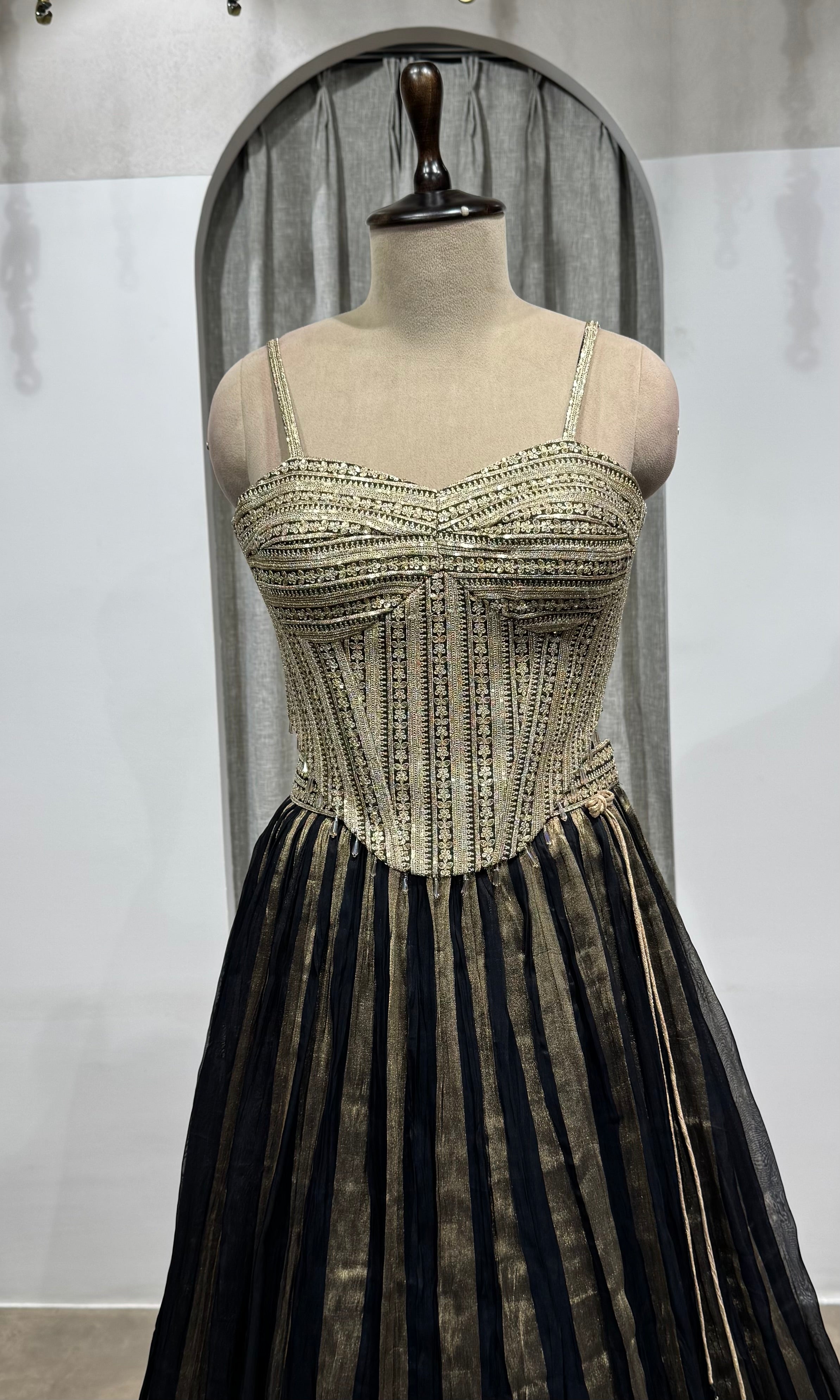 black and gold striped corset lehenga
