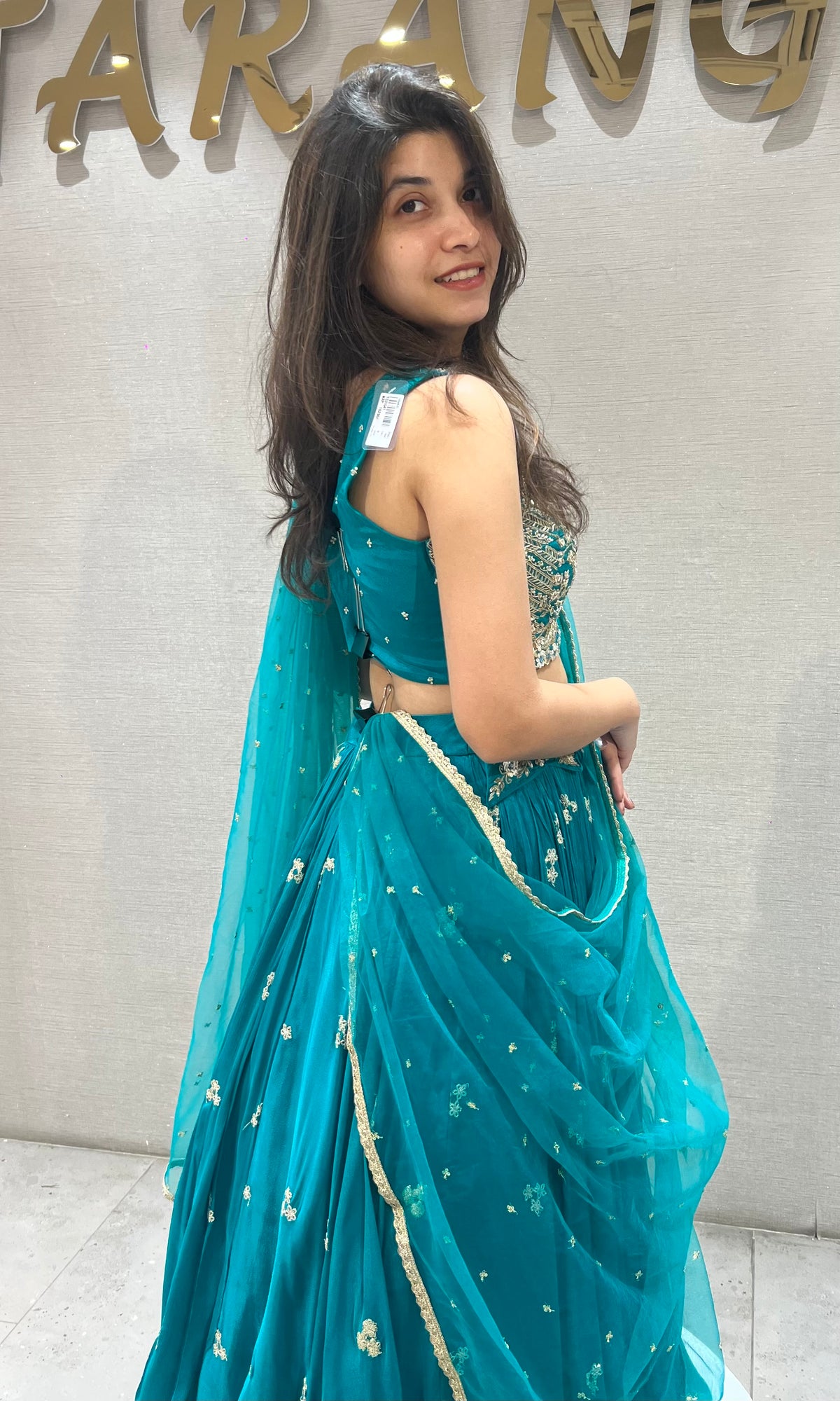 Teal blue gold zari embroidered lehenga