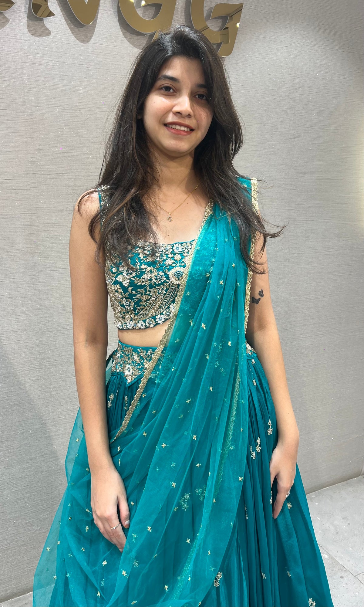 Teal blue gold zari embroidered lehenga
