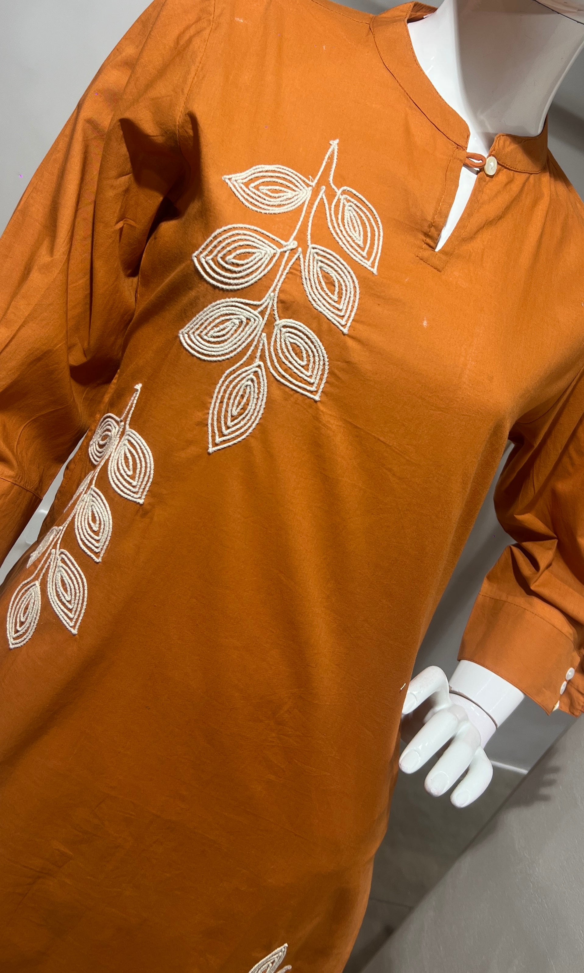 Orange leaf cotton kurta set with tassal dupatta
