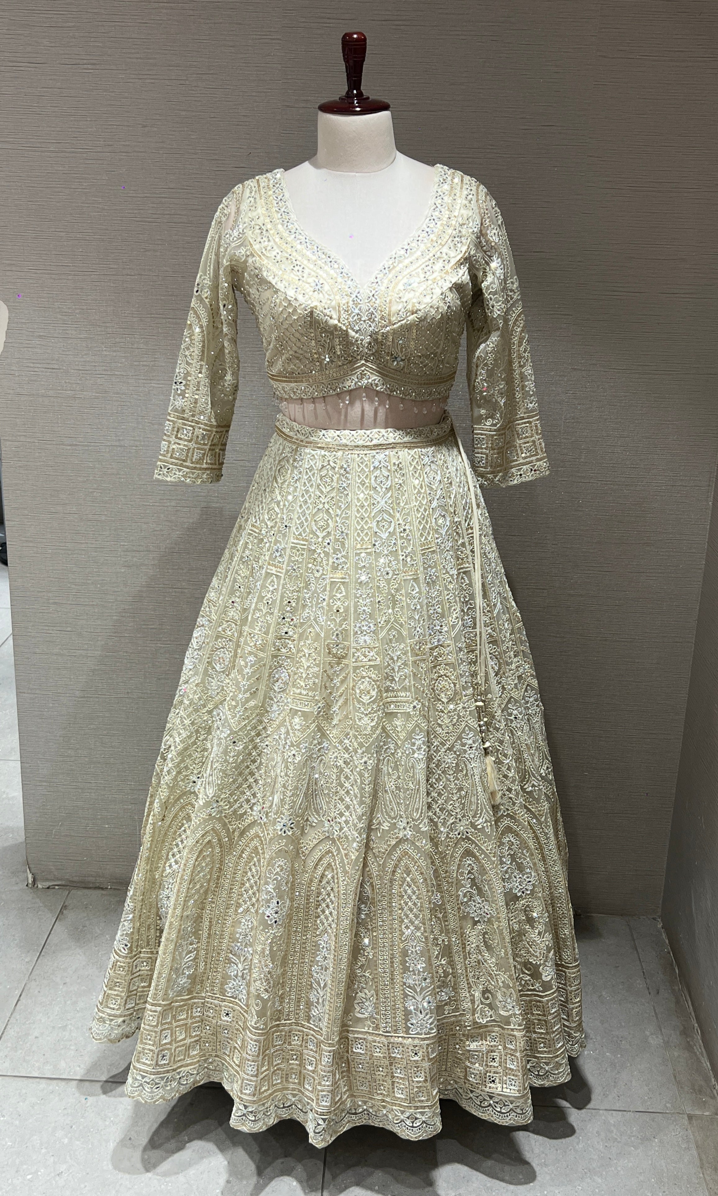 Half white ZARDOZI EMBROIDERED LEHENGA