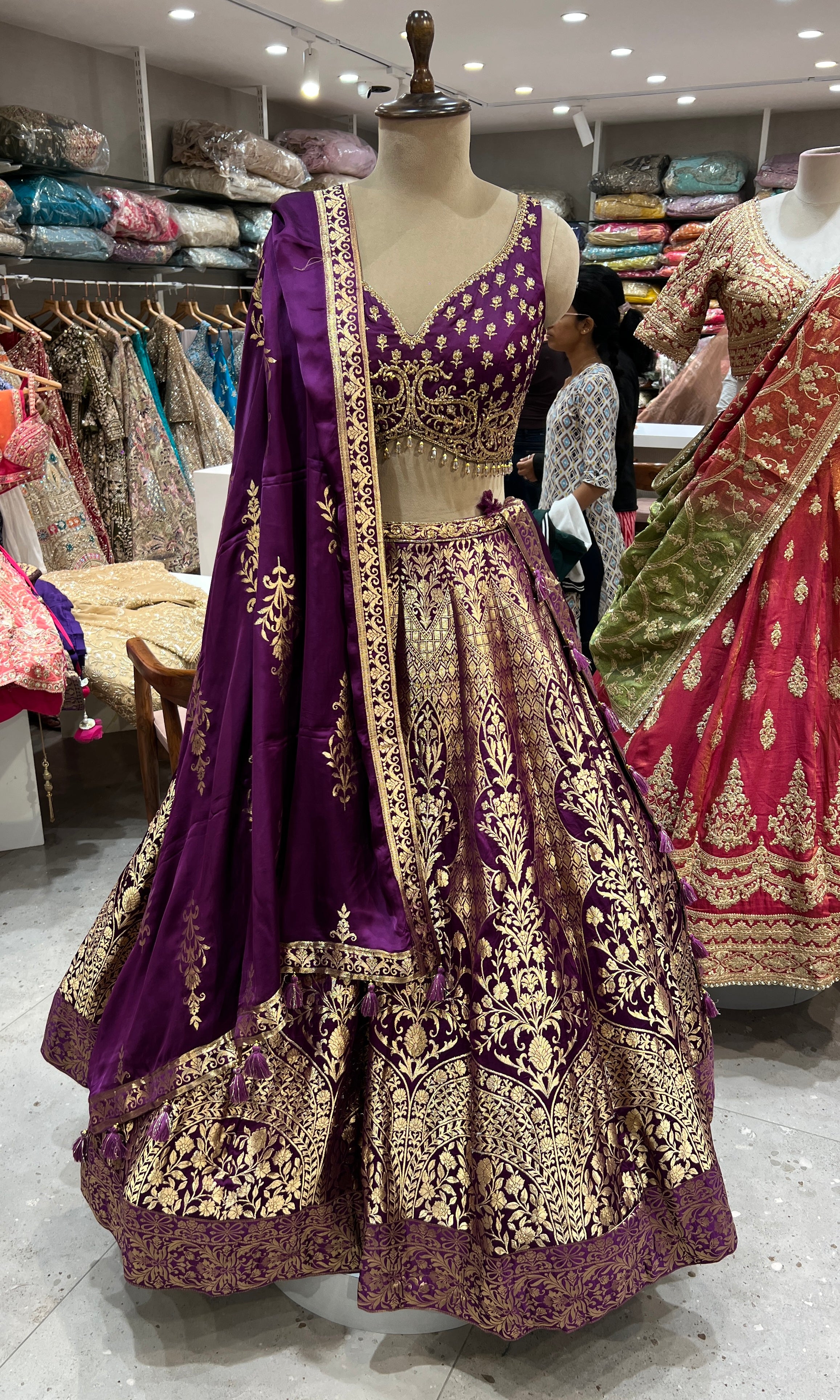 purple heavy gold embroidered lehenga