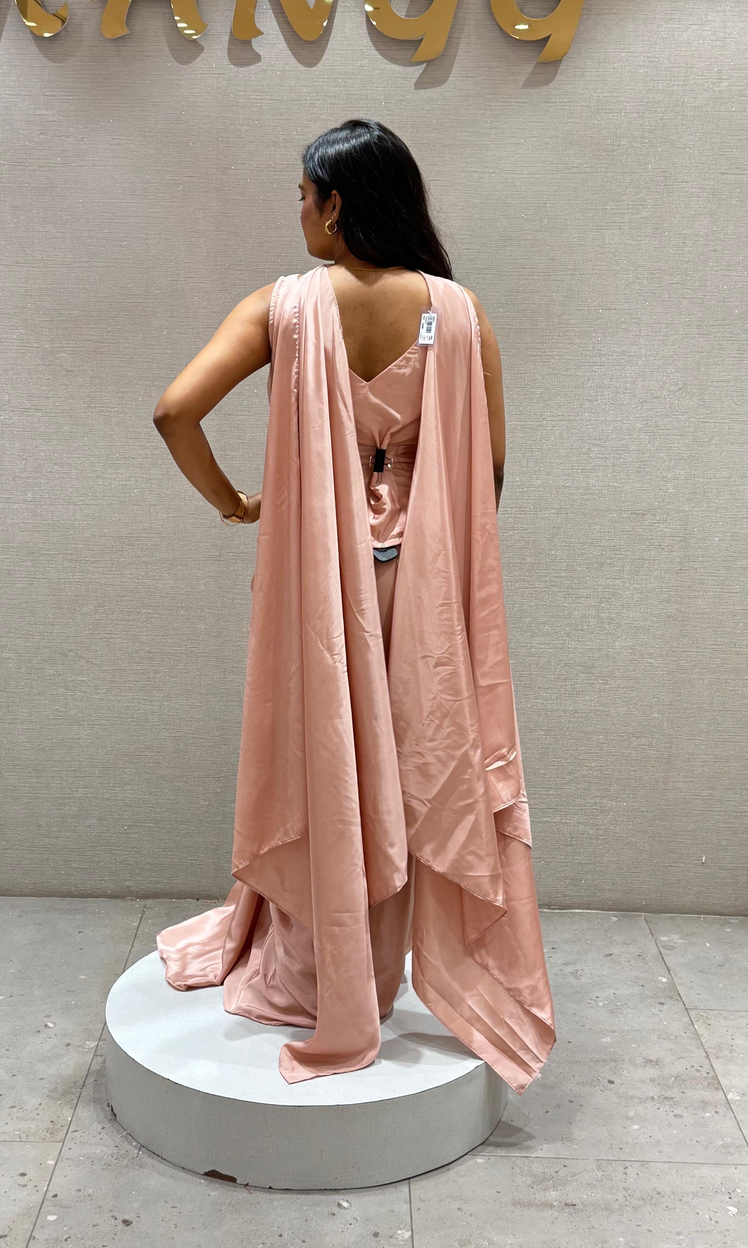 Baby pink PEPLUM SKIRT WITH CAPE