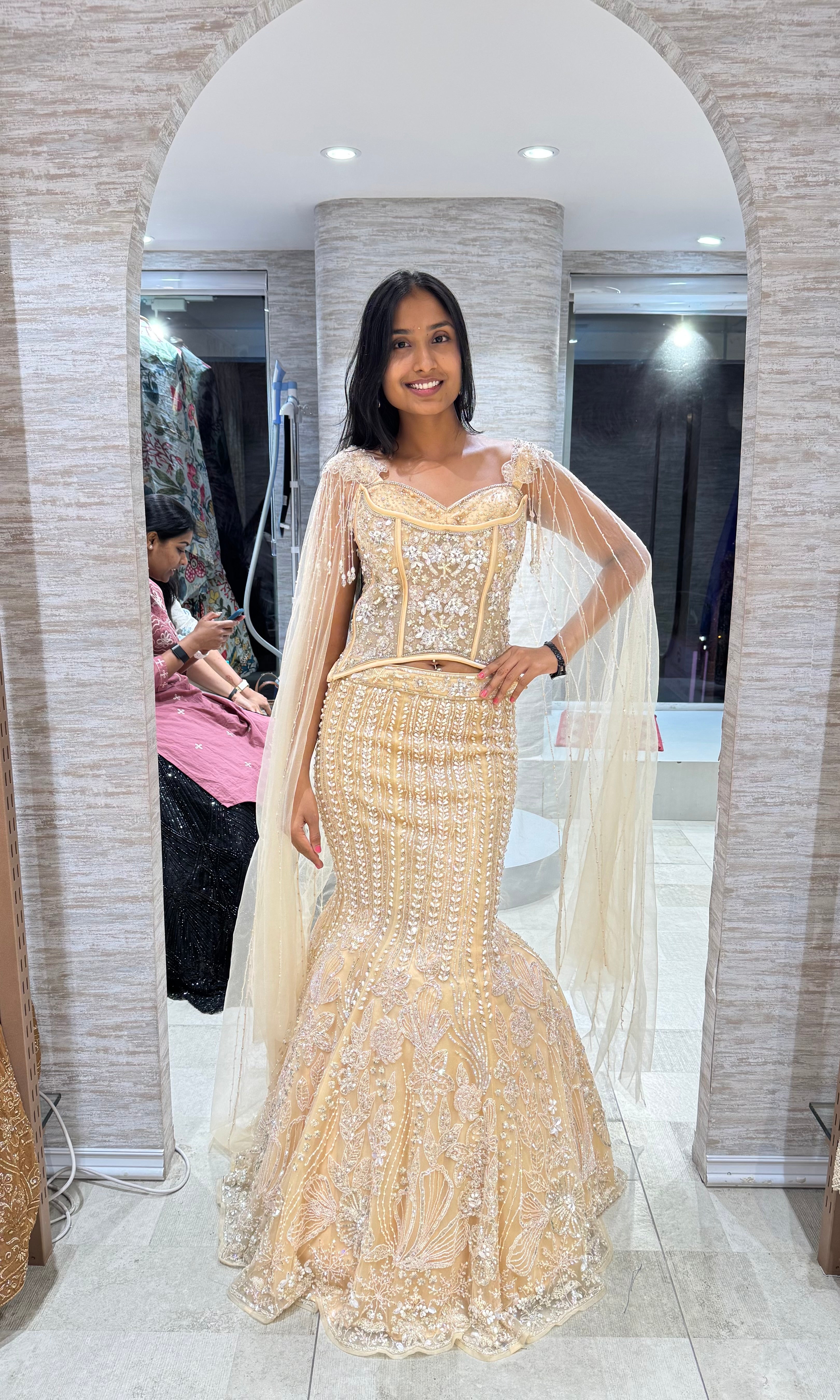 GOLD LEHENGA WITH CORSET BLOUSE & CAPE