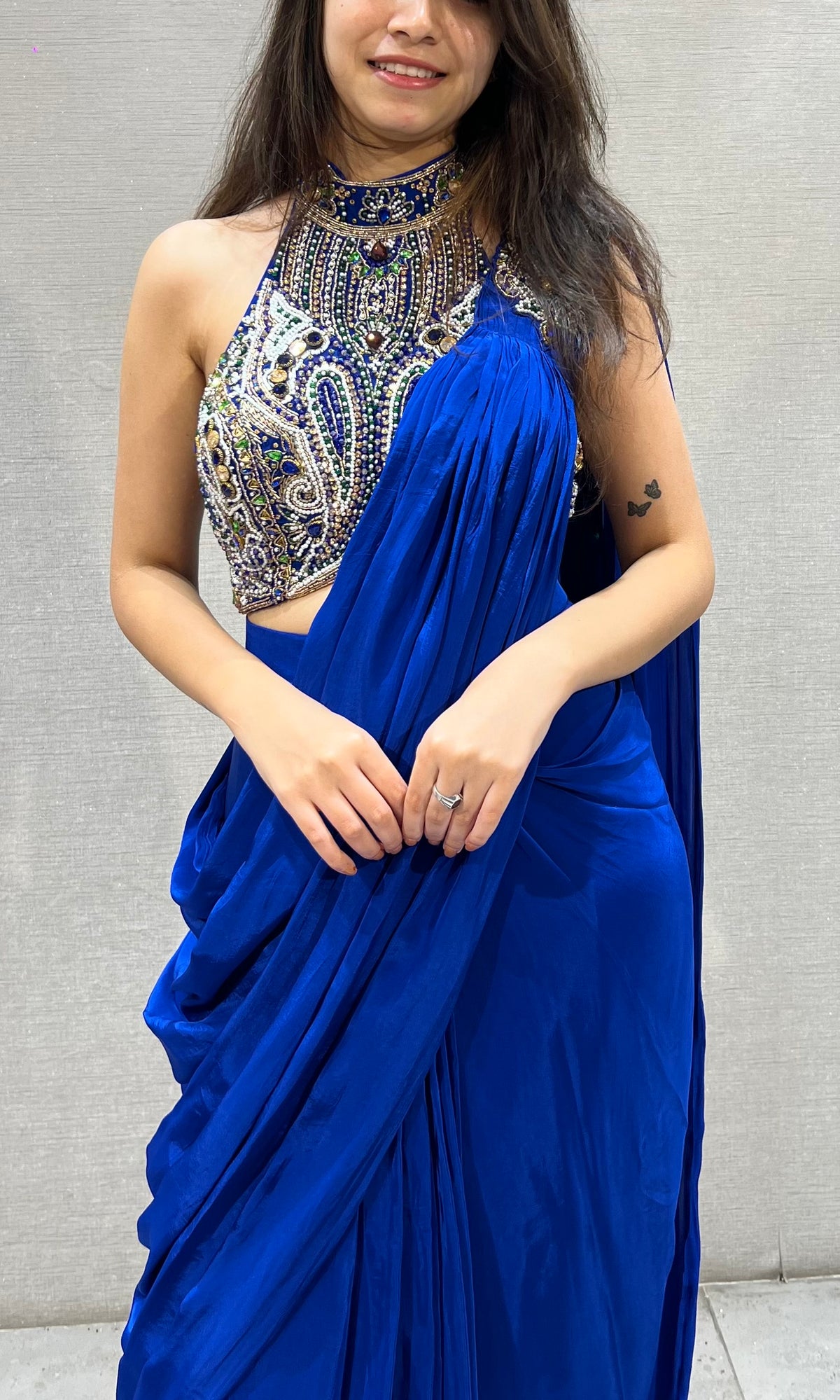 Royal blue draped saree with Crystals & Beadwork Halter blouse