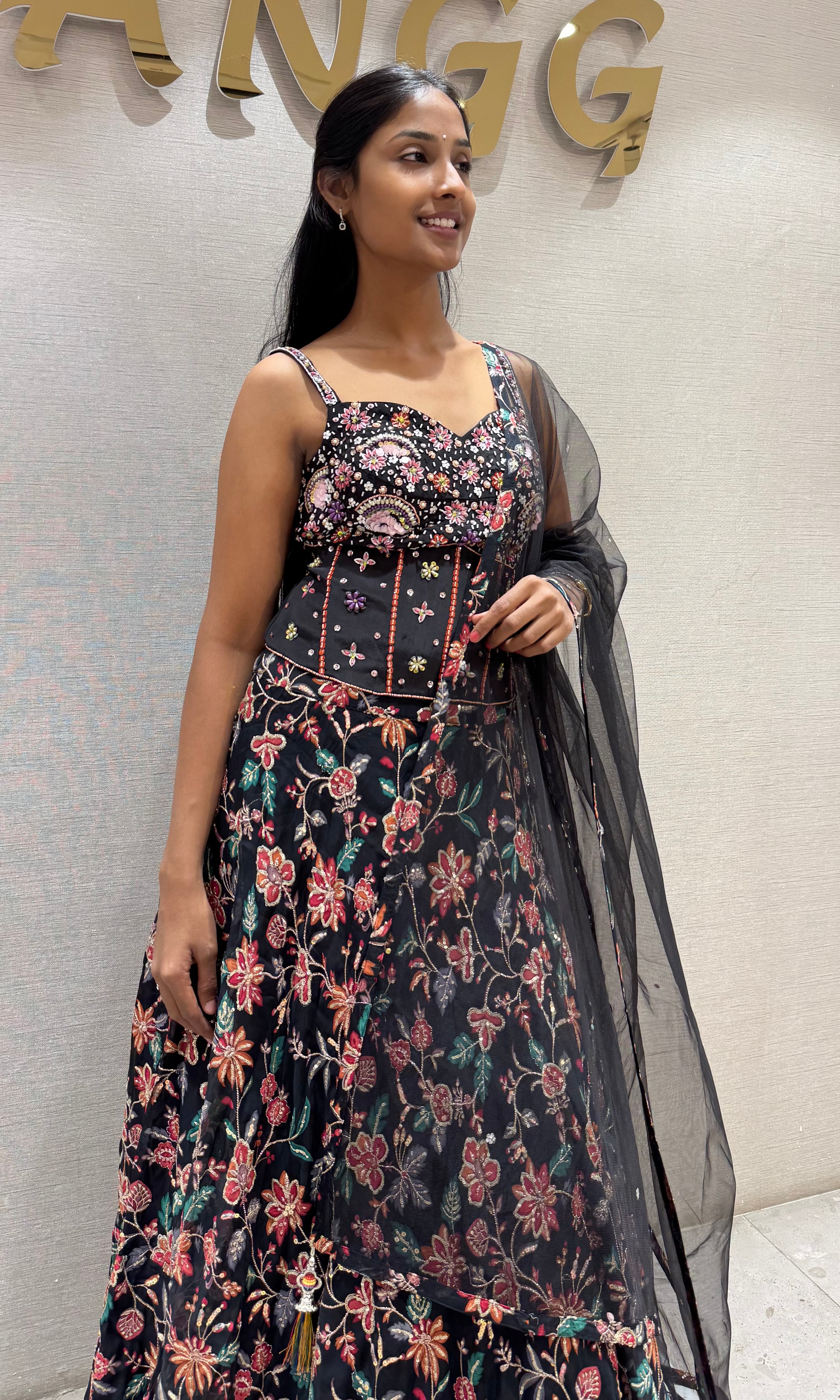 black floral printed lehenga set with corset blouse