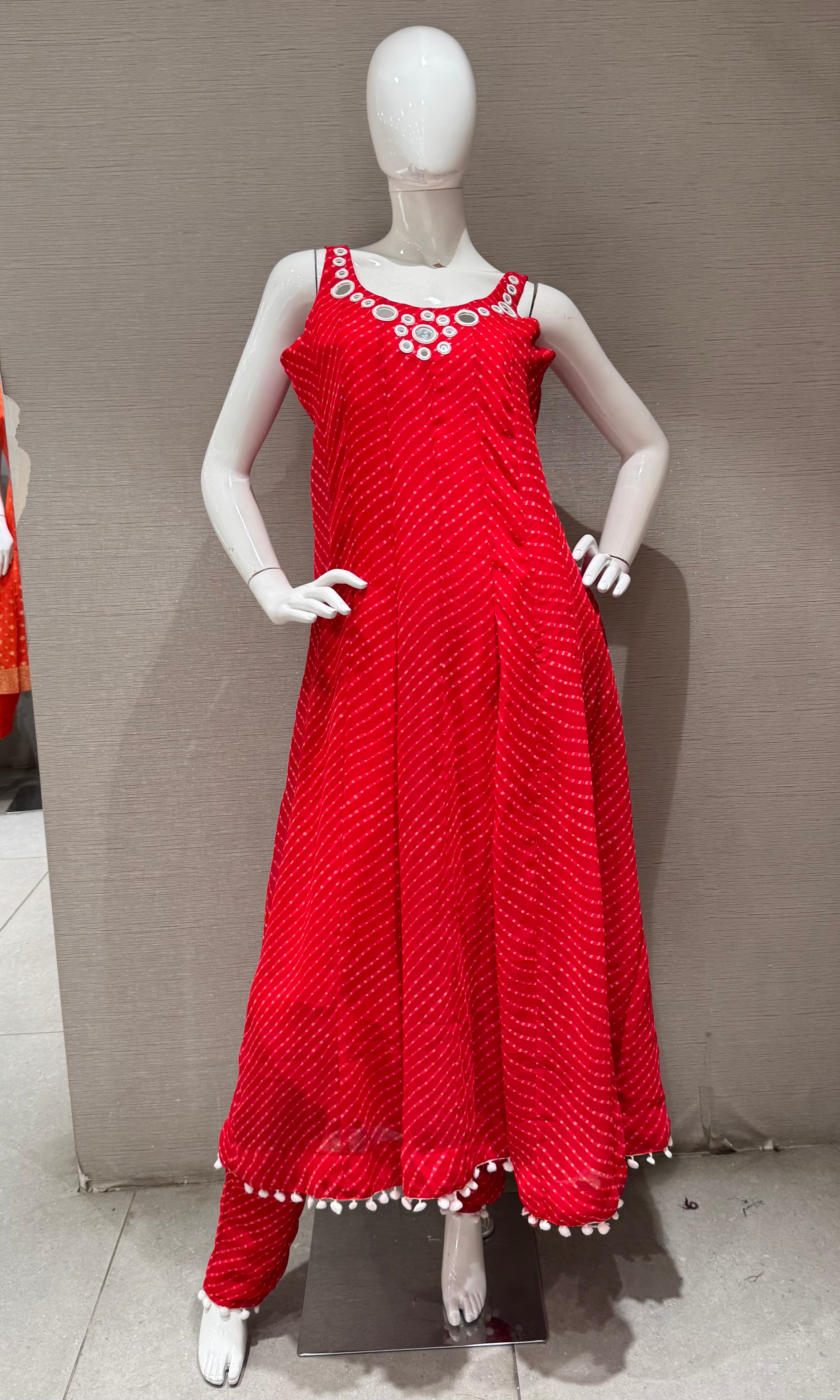 Red bandhani print and intricate mirror anarkali set