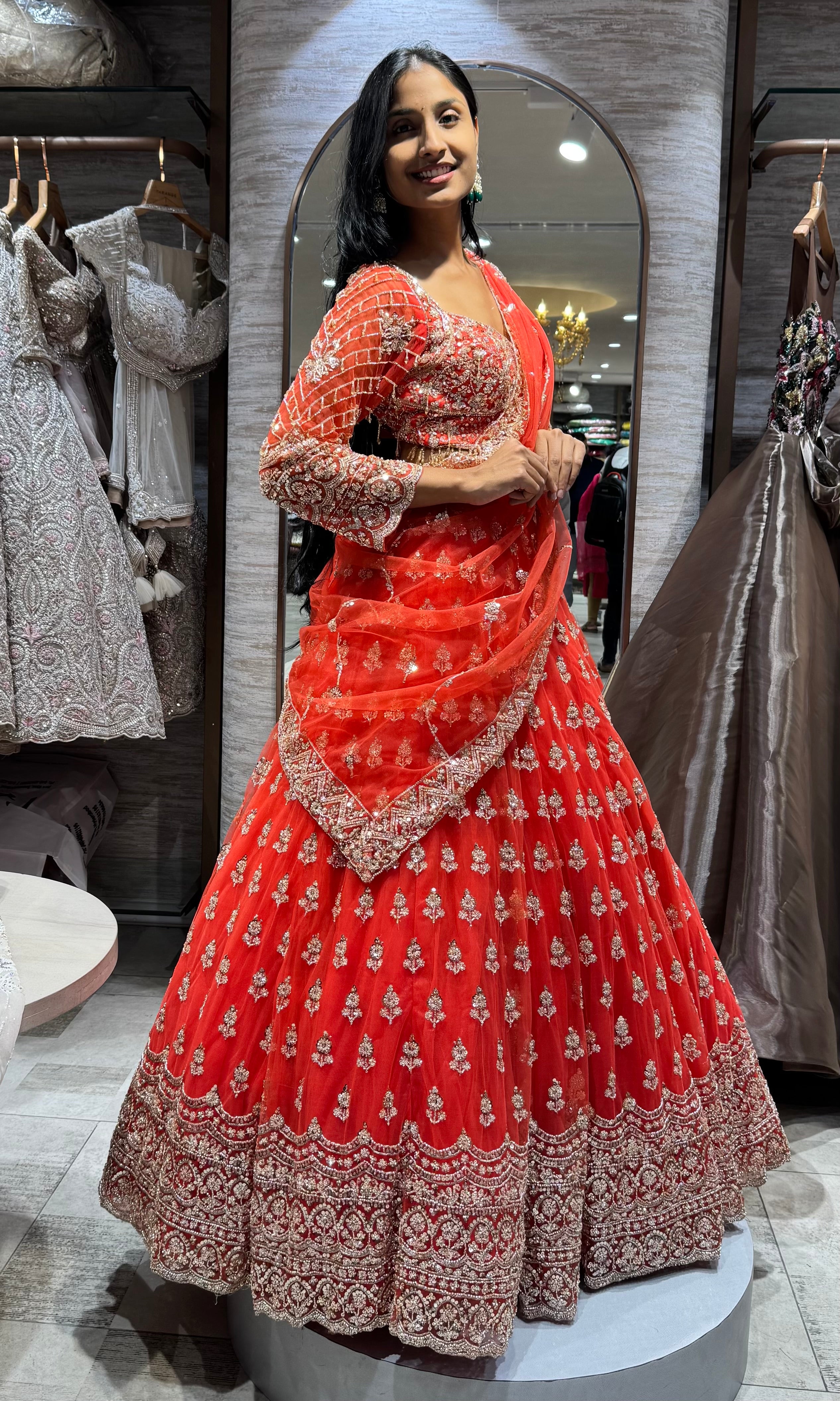 orange bridal intricate embroidery lehenga