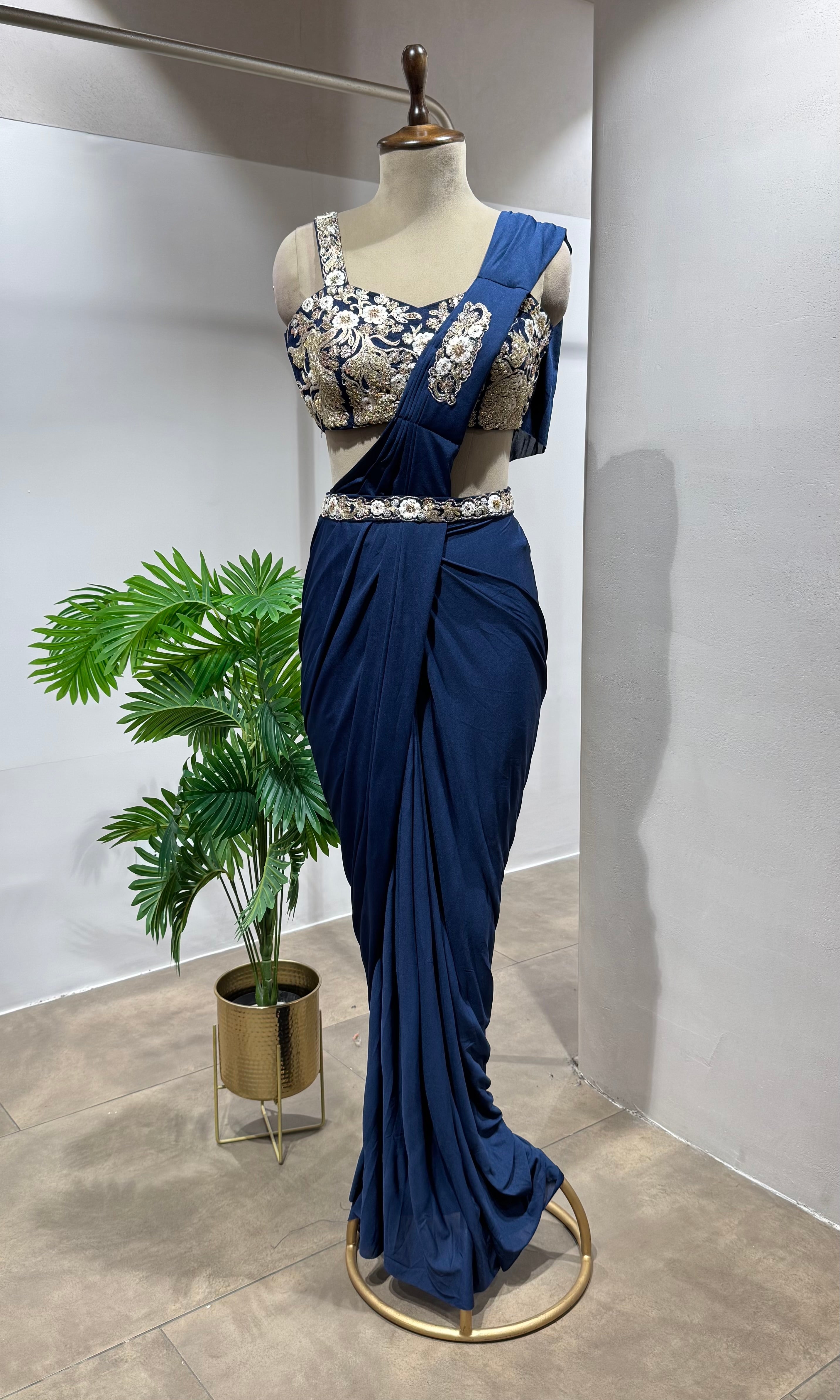blue embroidered draped saree with corset blouse