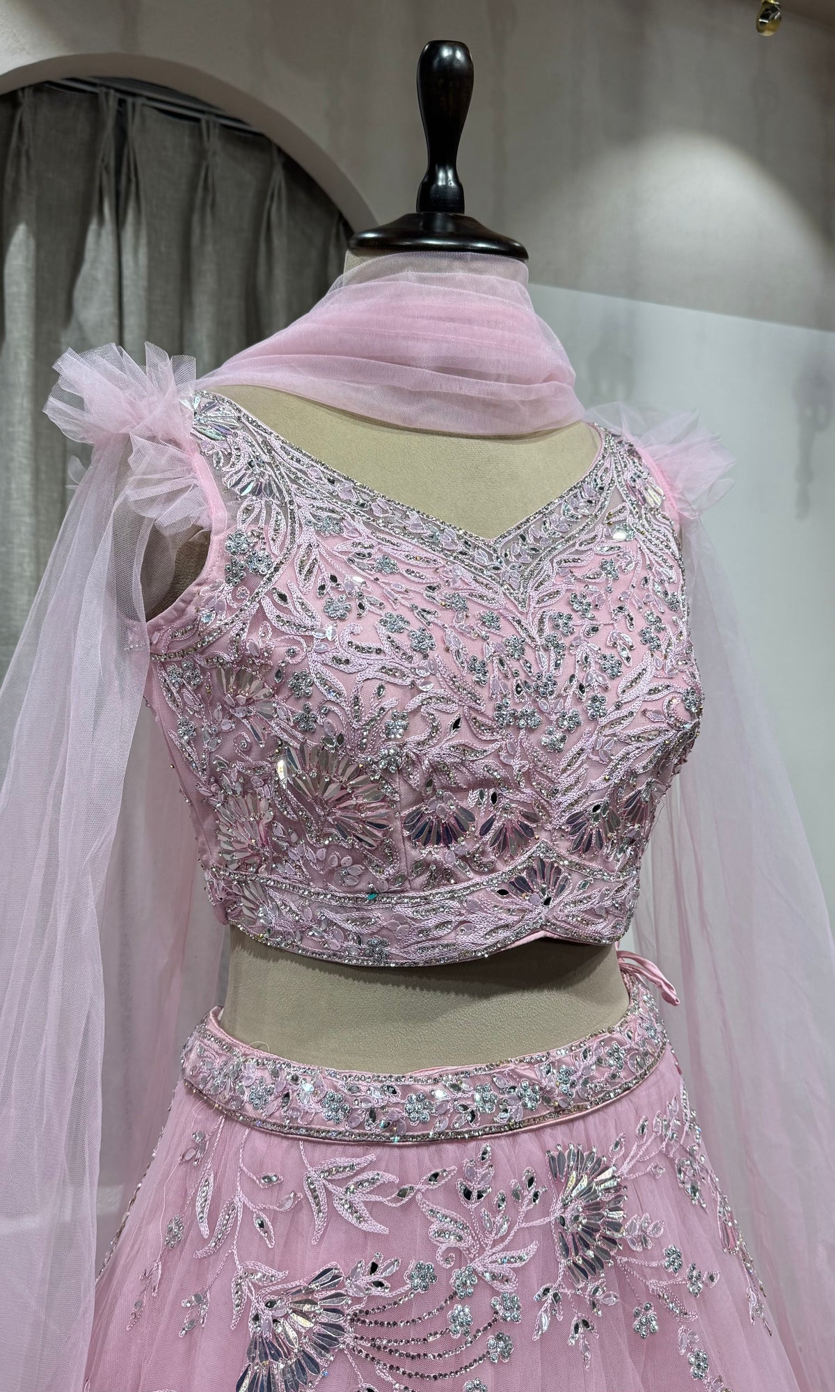 pink floral embroidered net crop top lehenga