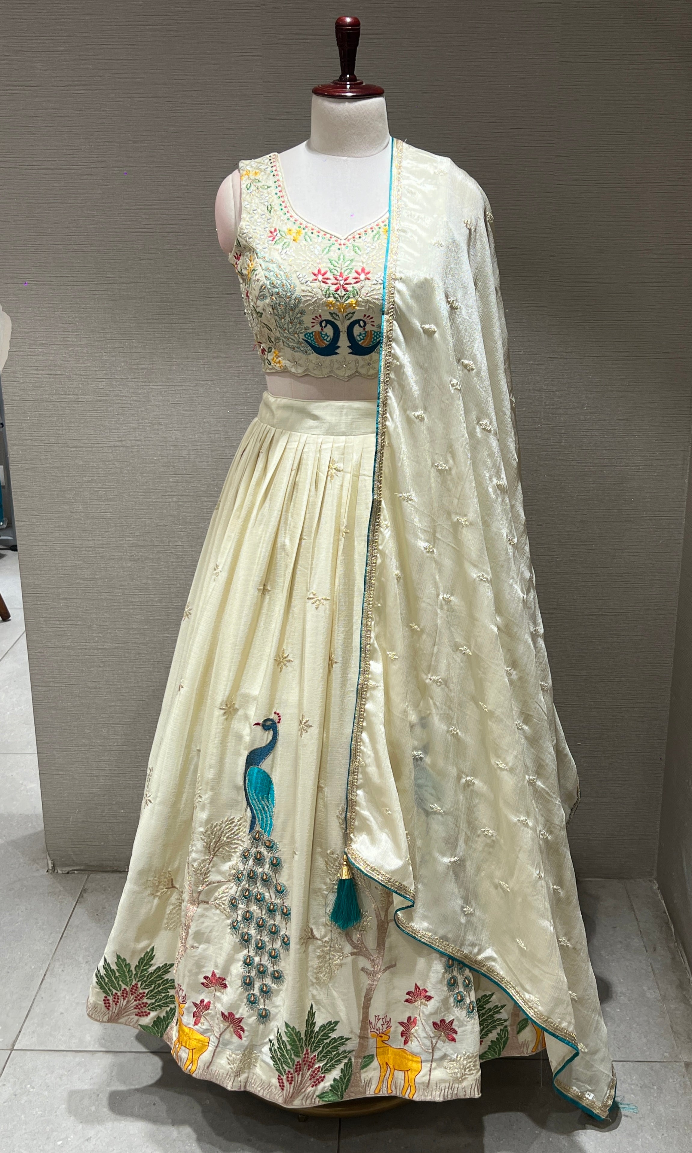 Cream Lehenga WITH PEACOCK DESIGN