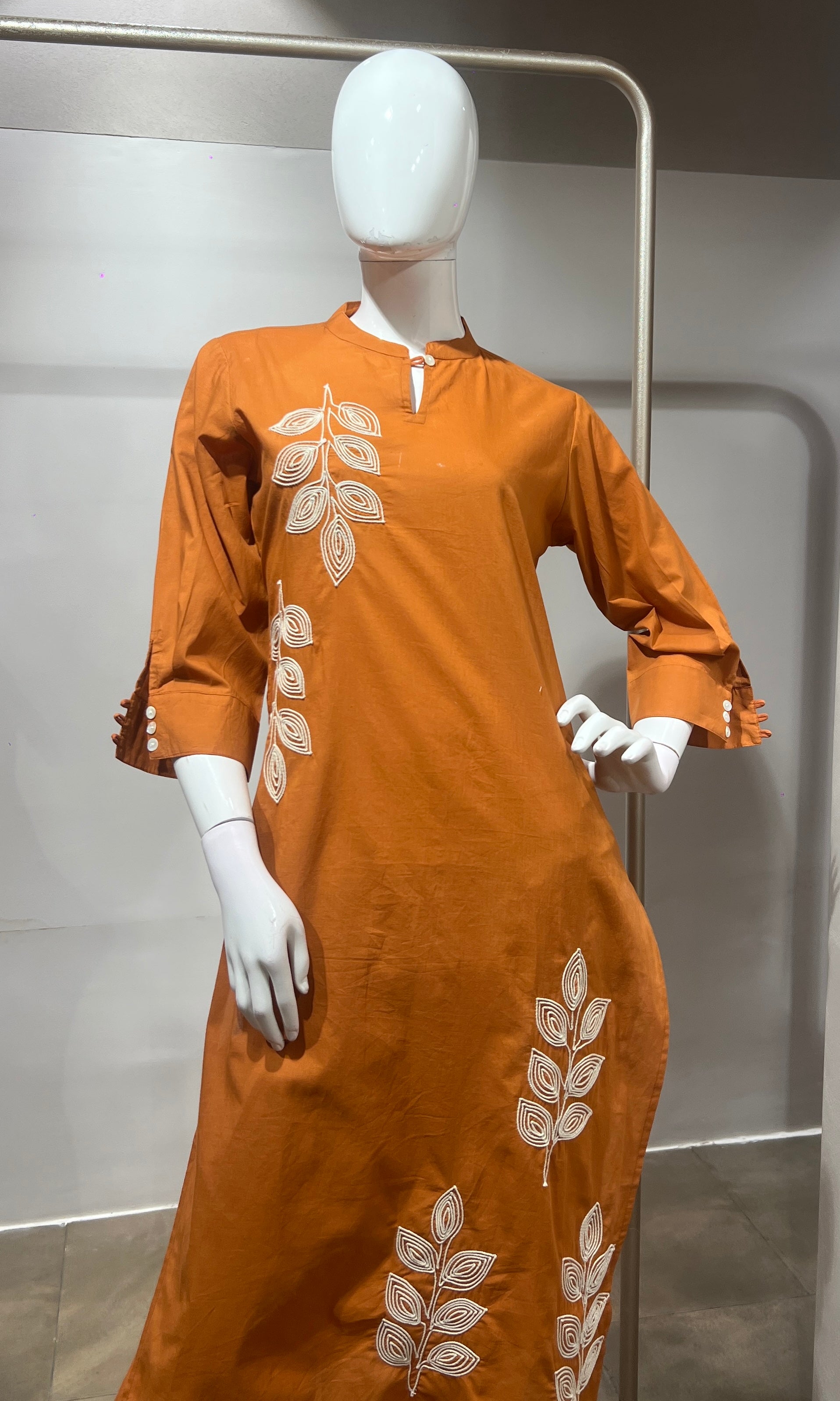 Orange leaf cotton kurta set with tassal dupatta