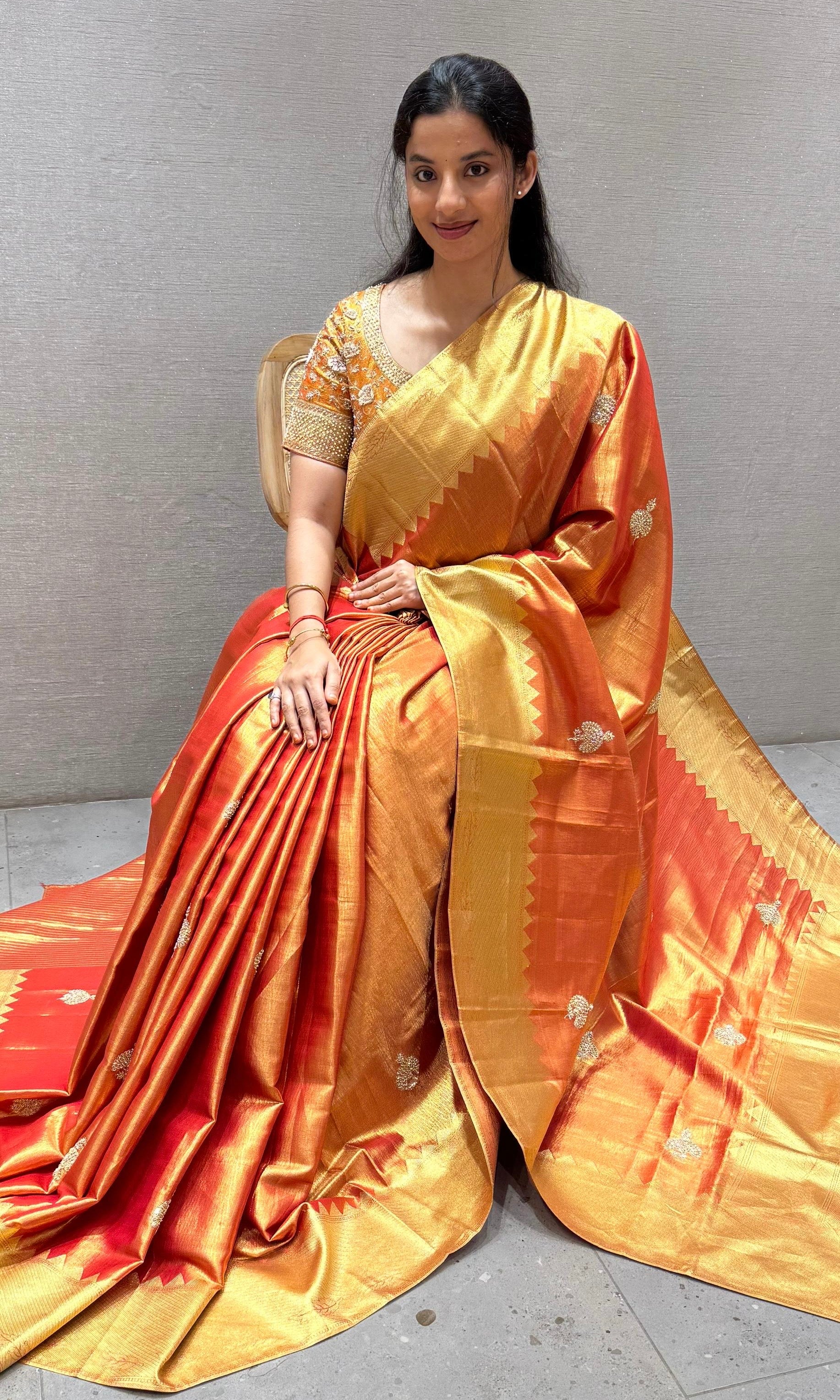 Orange saree with ready blouse