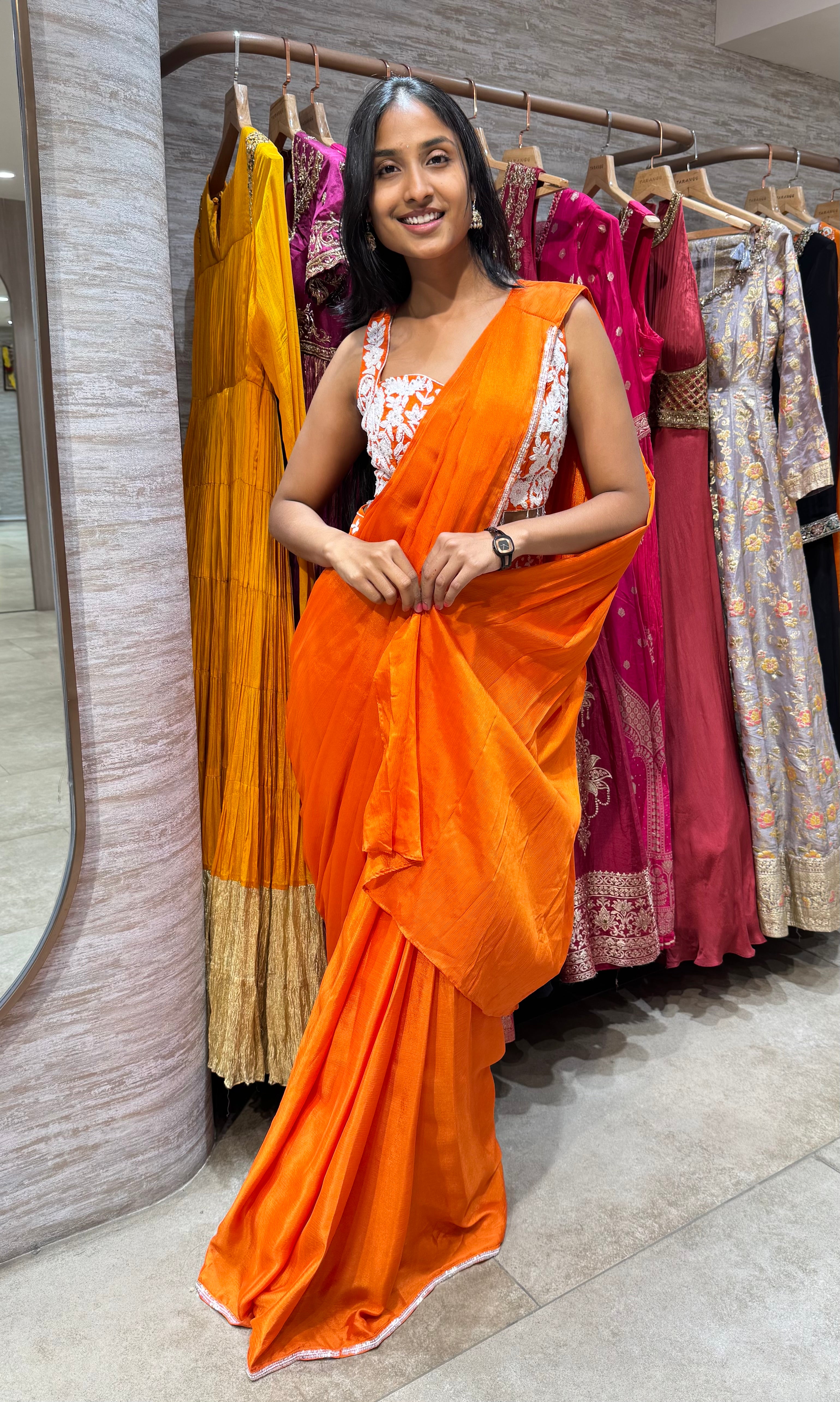 ORANGE DRAPE SAREE WITH CORSET BLOUSE
