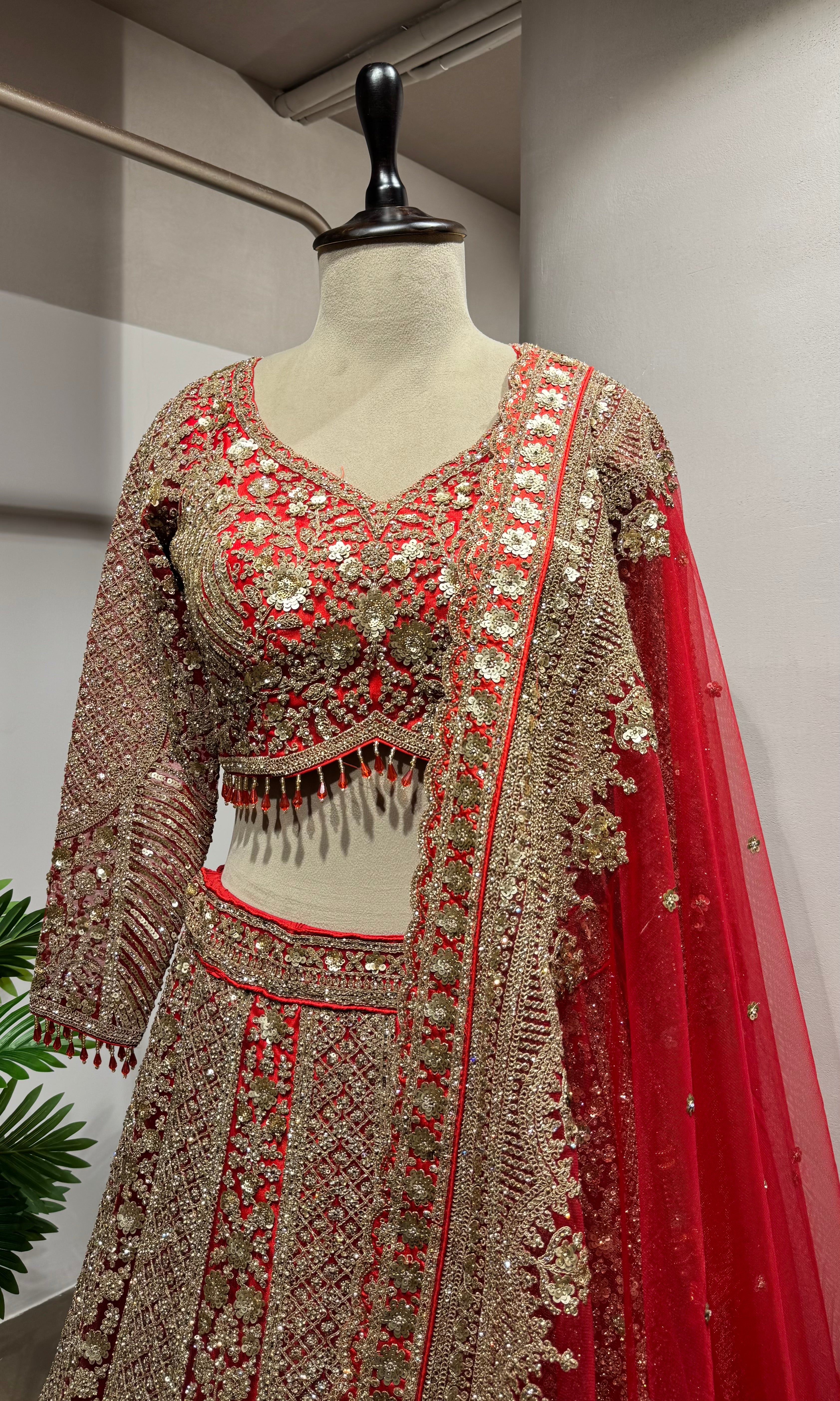 Red golden embroidery bridal lehenga