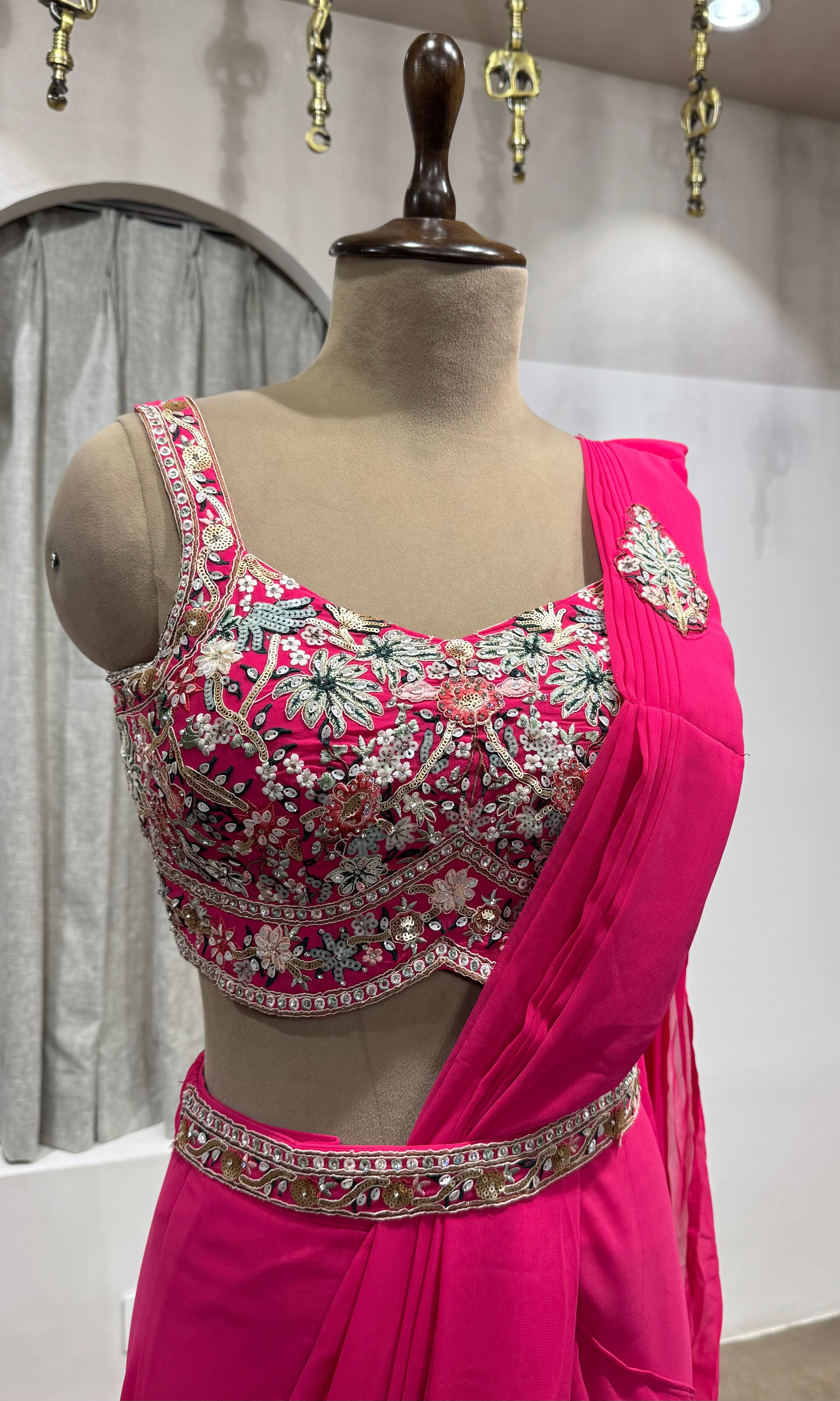 Pink drape saree with floral blouse & belt