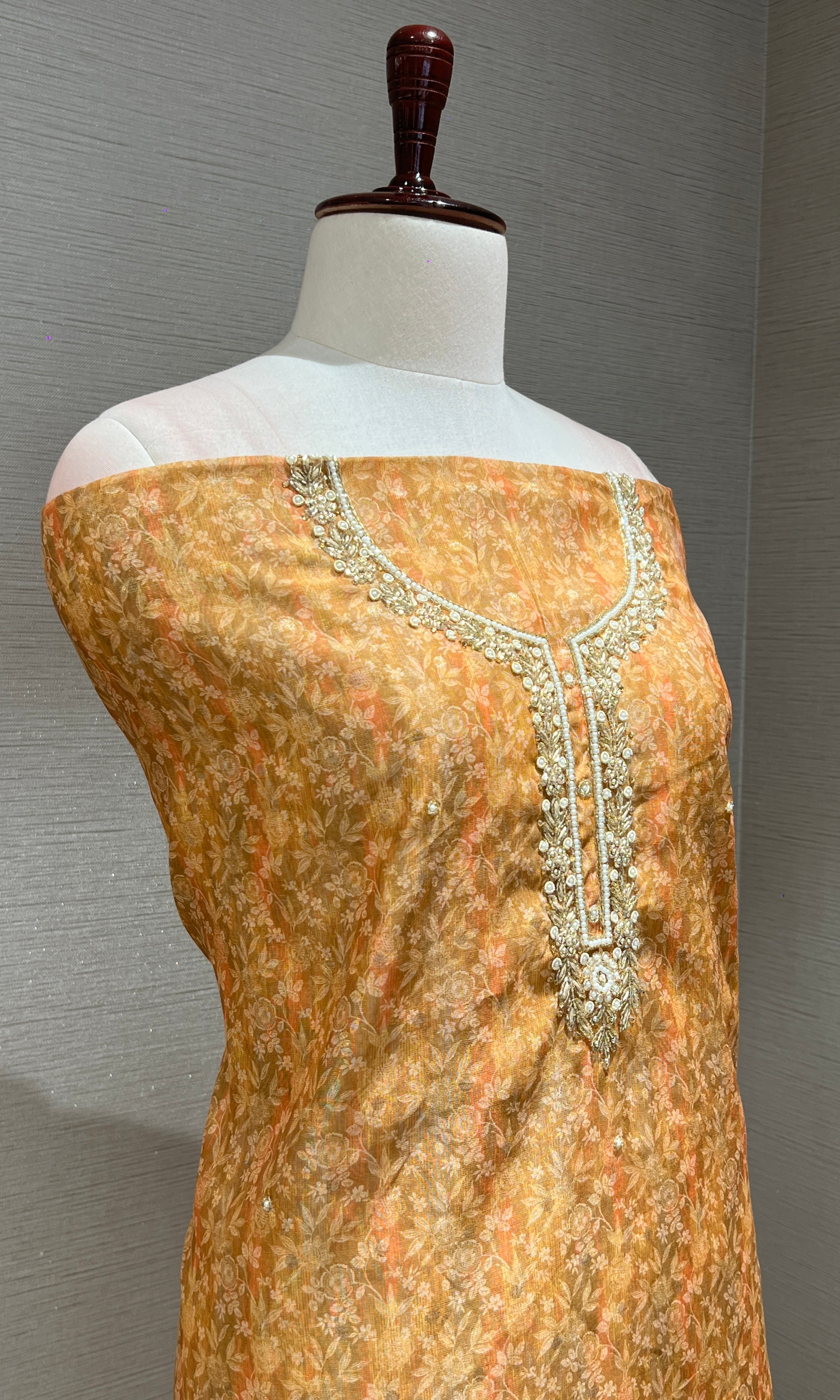Yellow and golden dress material