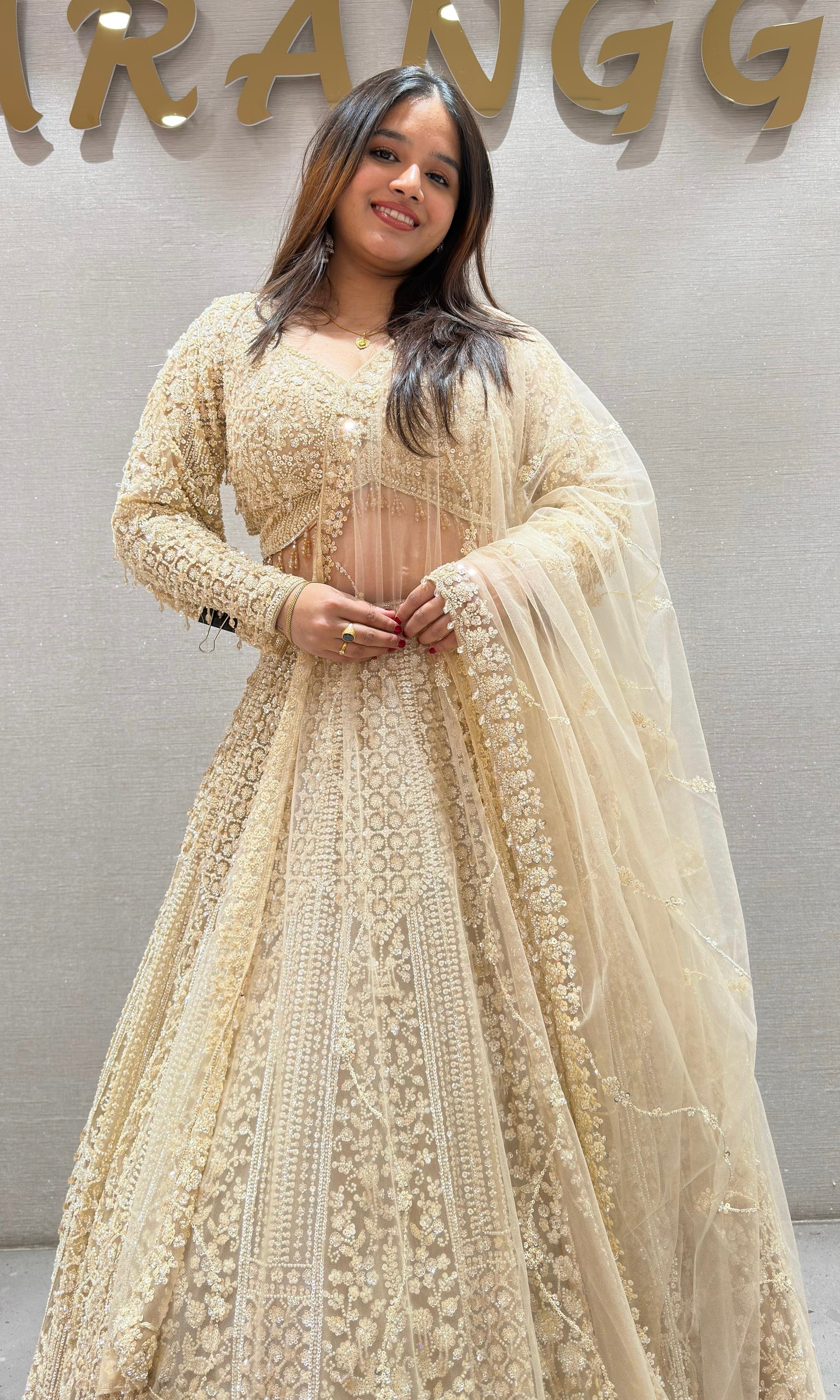 Ivory HEAVY GOLDEN EMBROIDERED Lehenga