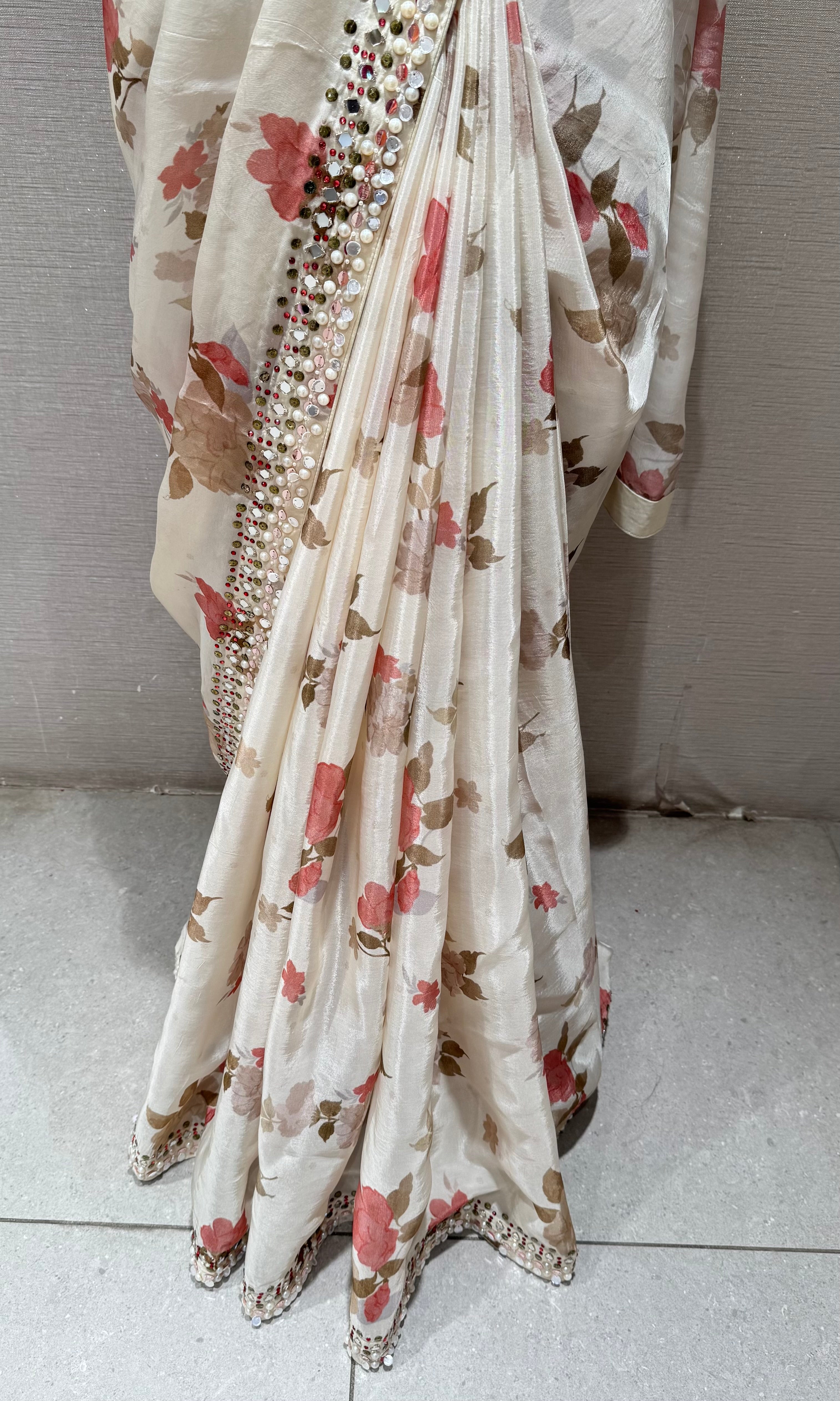 Cream elegant floral saree with embellished blouse