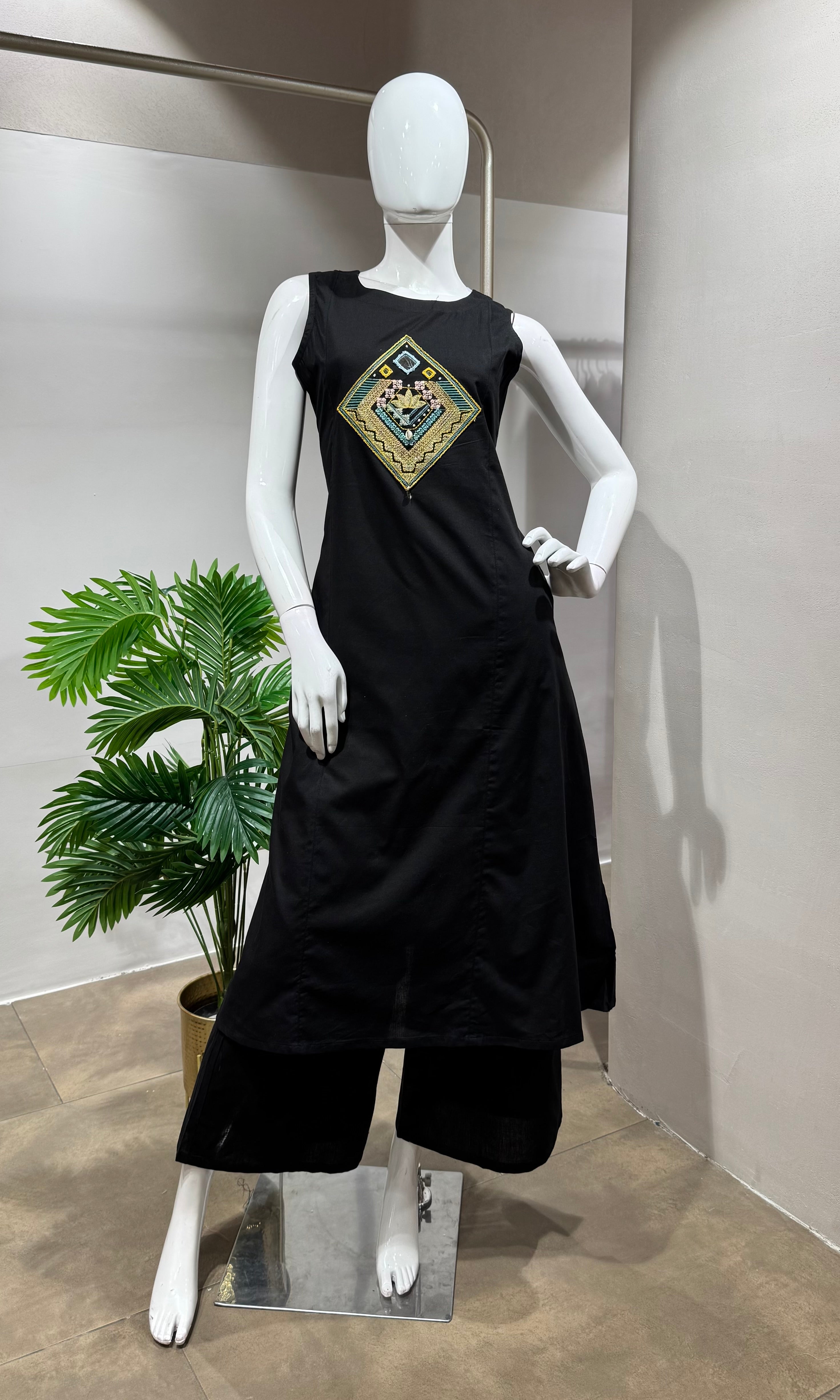 Black Sleeveless Kurta with Embroidered Yoke