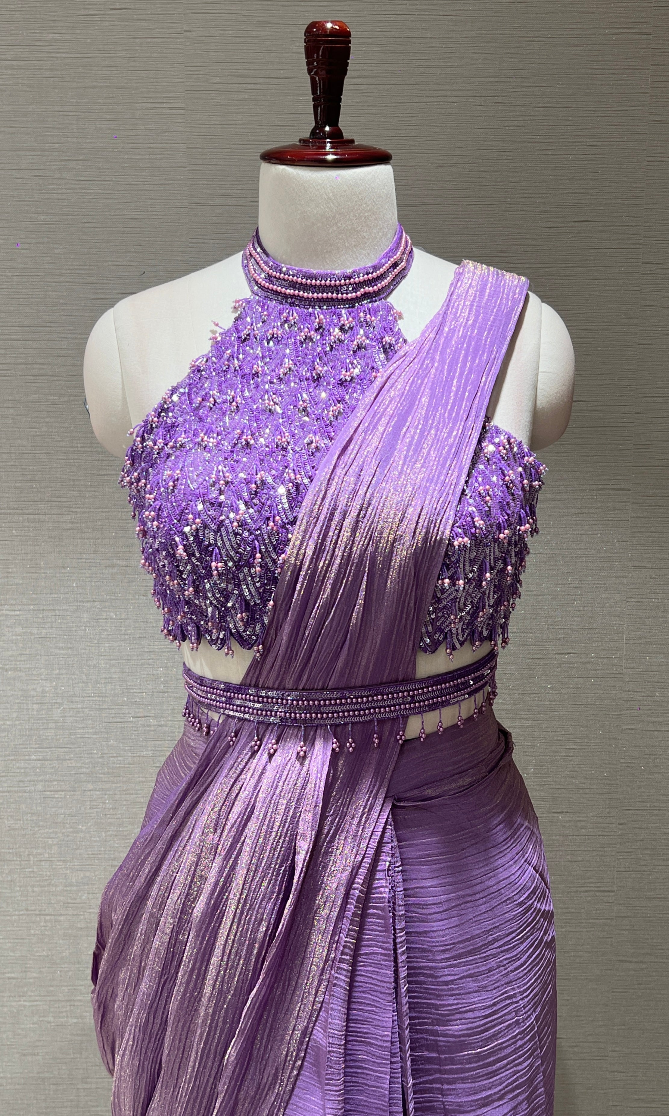Purple drape saree with halter neck blouse