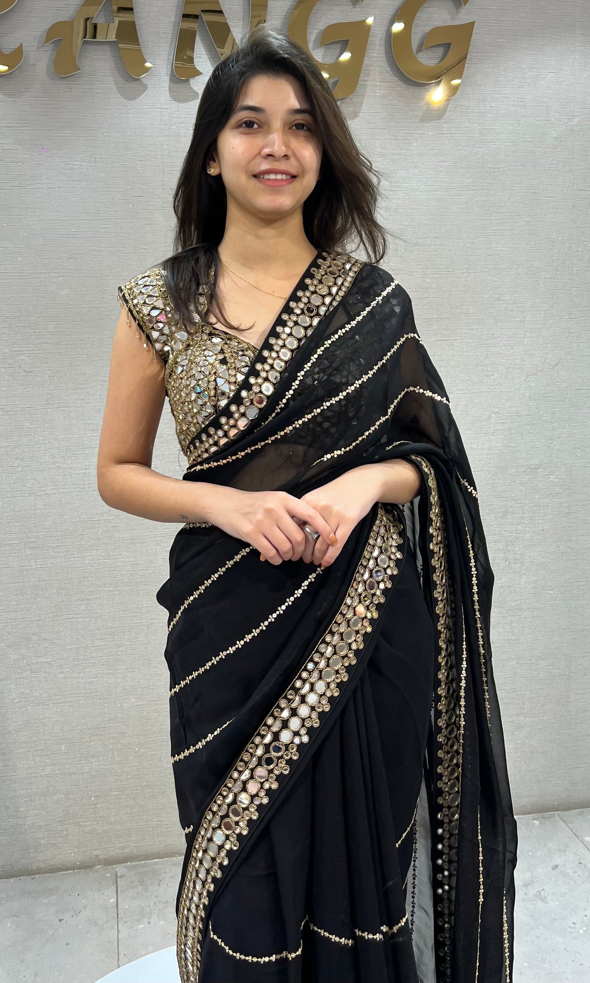 Black Georgette Saree with Golden Zari & Mirror Embroidery