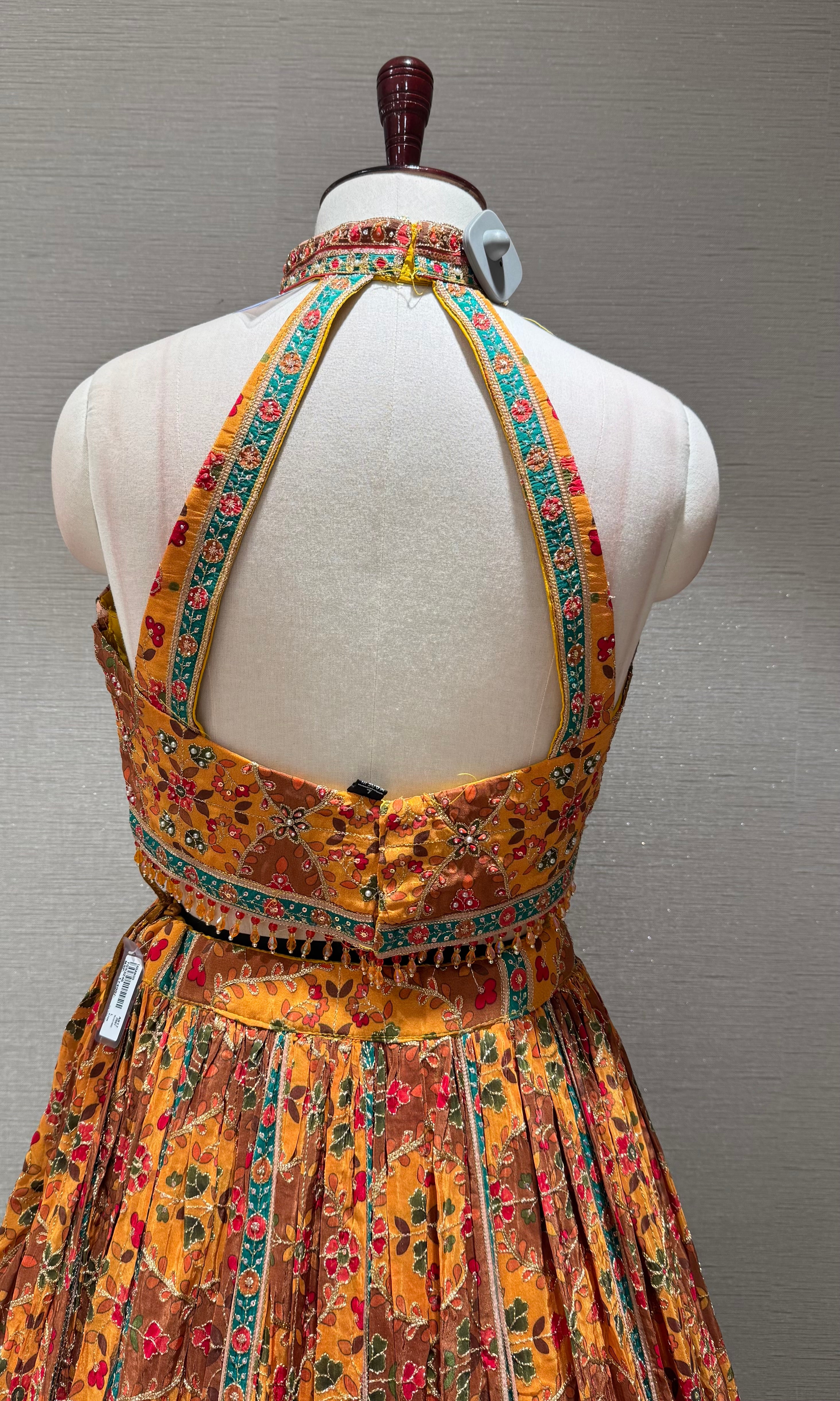 Mustard Mayur Pichwai halter neck Lehenga set